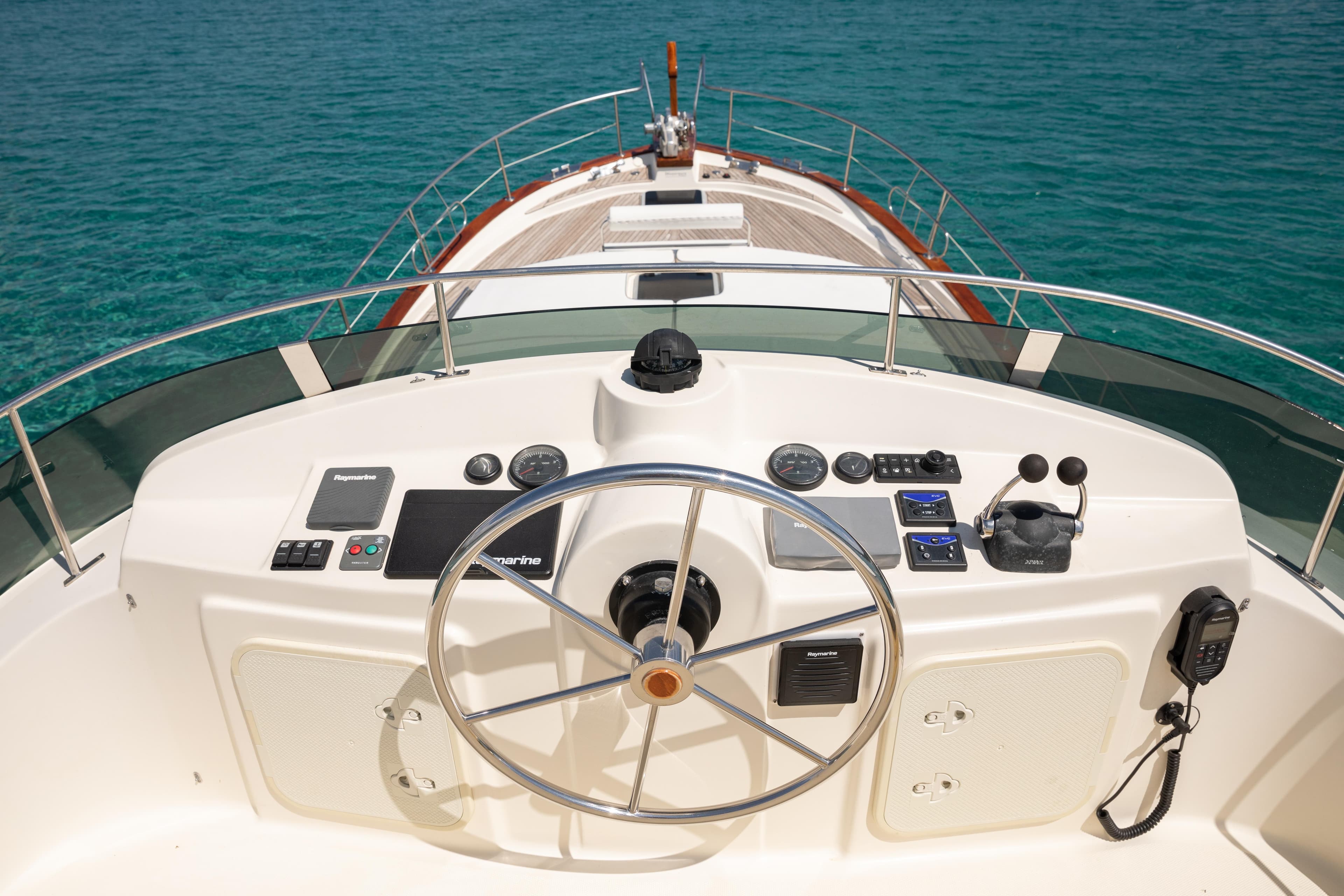 Helm of 2006 Menorquin 160 Fly yacht with ocean view.