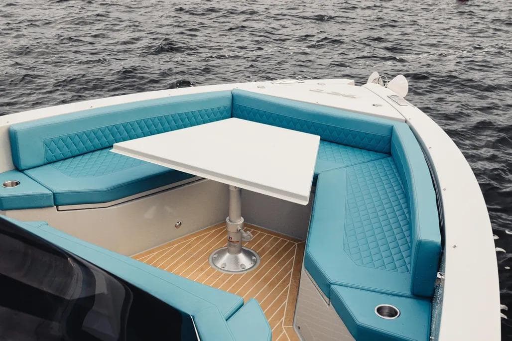 De Antonio Yachts D29, 2026, featuring blue seating and table on water.