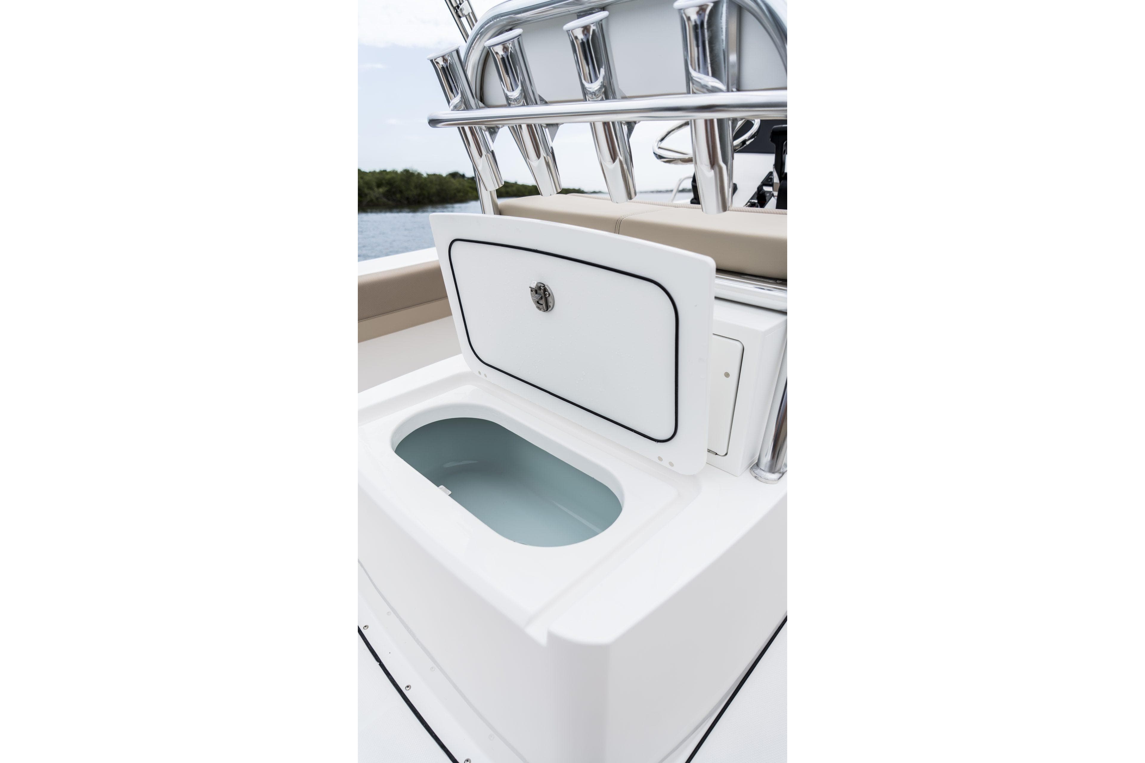 Edgewater 188CC 2025 boat with open storage compartment.