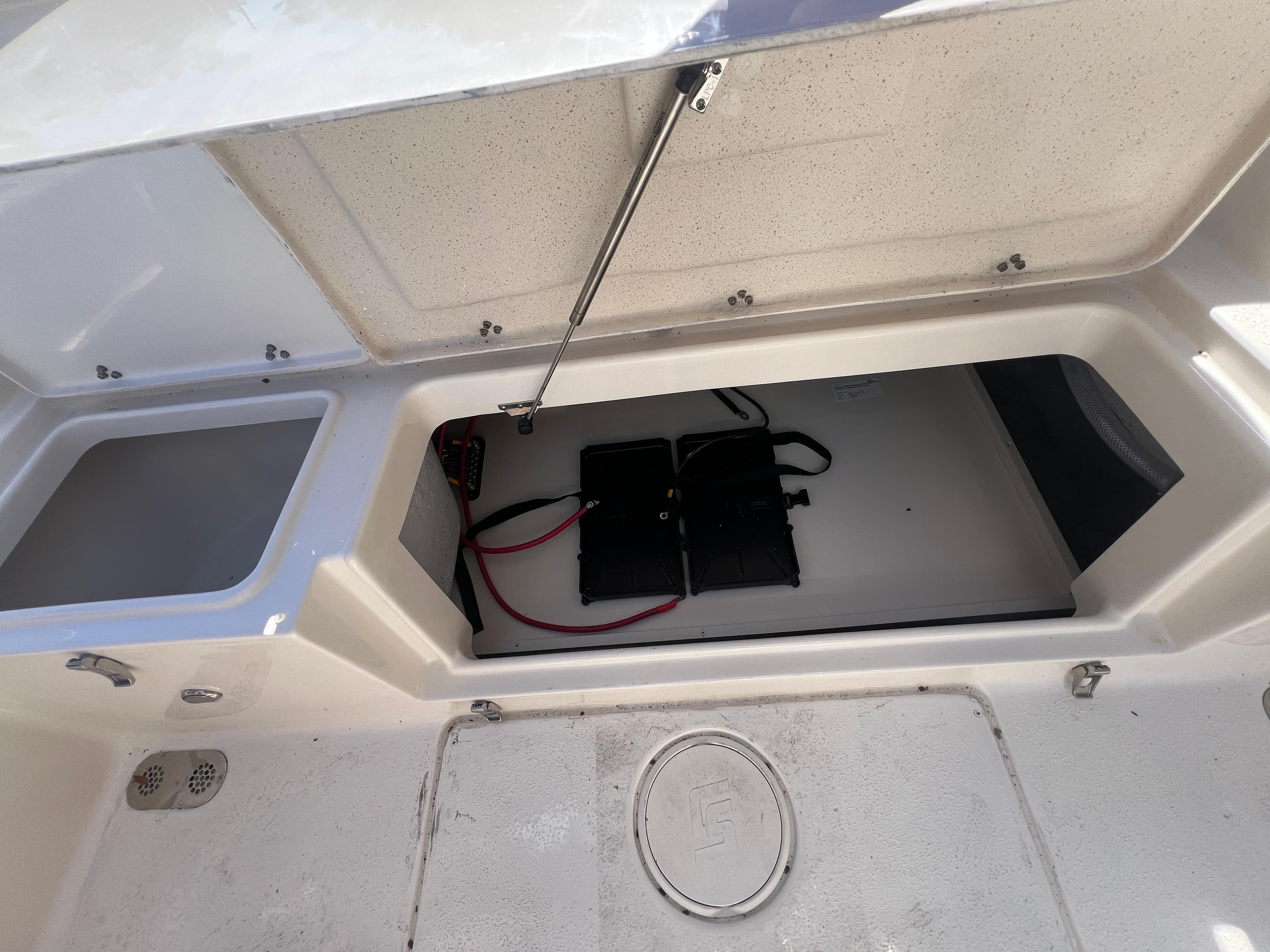 Open storage compartment in 2025 Sea Chaser 22 HFC boat.