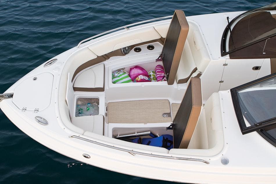 Manufacturer Provided Image: 2016 Chaparral 307 SSX boat interior with seating and storage compartments.