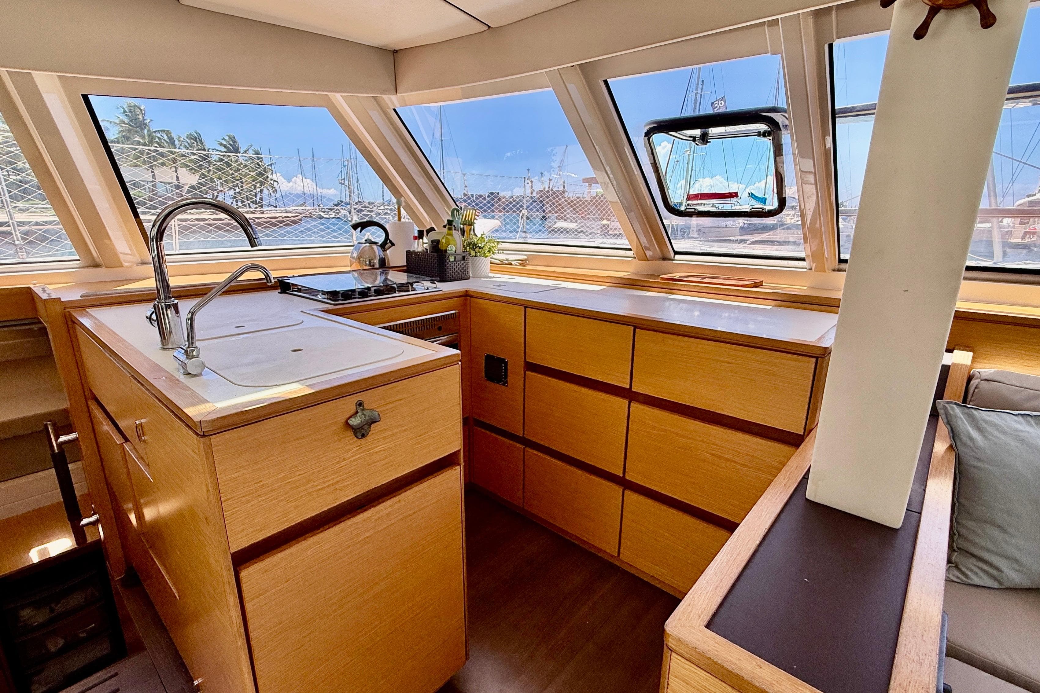 Interior of 2016 Nautitech 46 Open catamaran, featuring a modern kitchen with ample natural light.