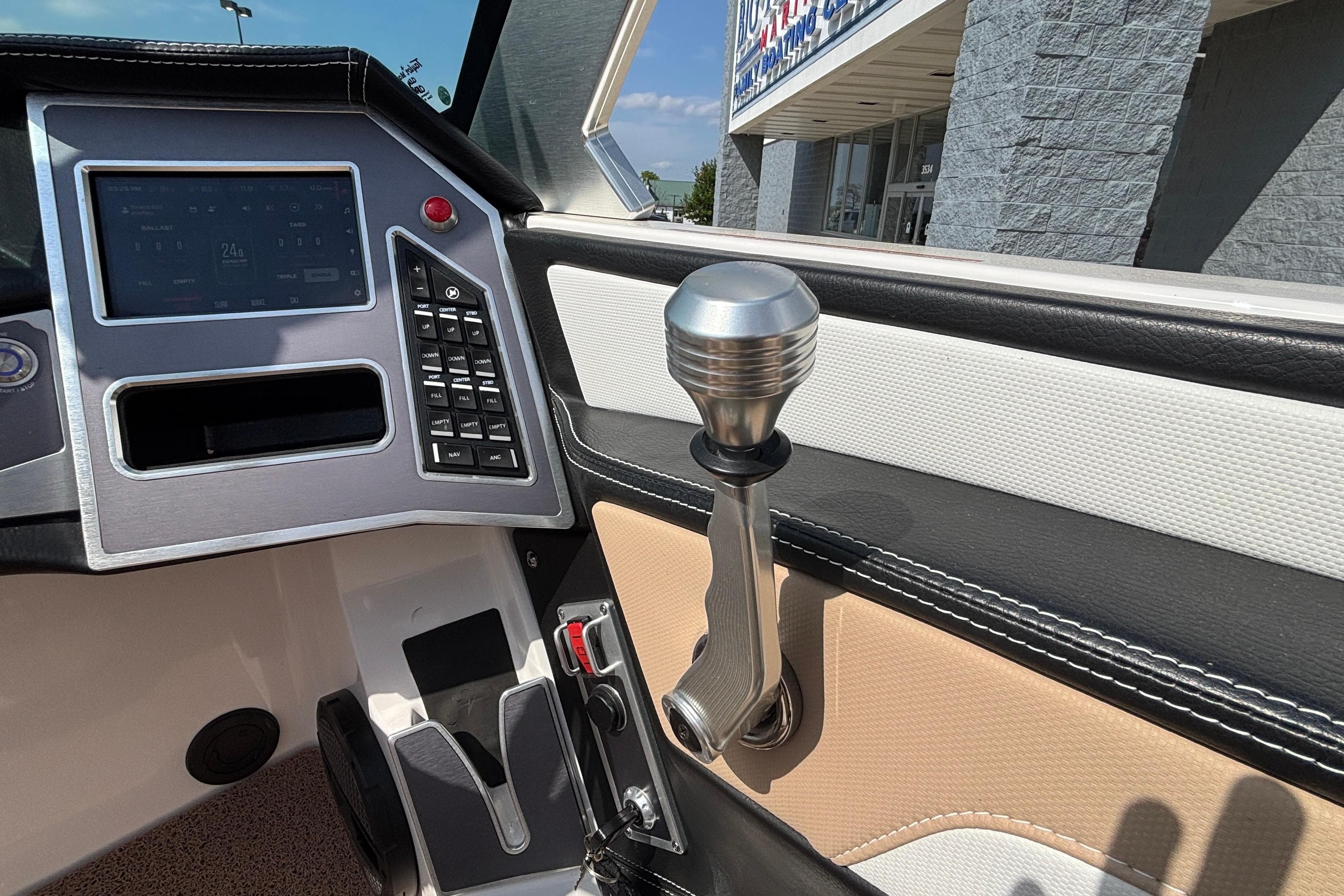 2024 MasterCraft XT24 boat dashboard with modern controls and sleek design.