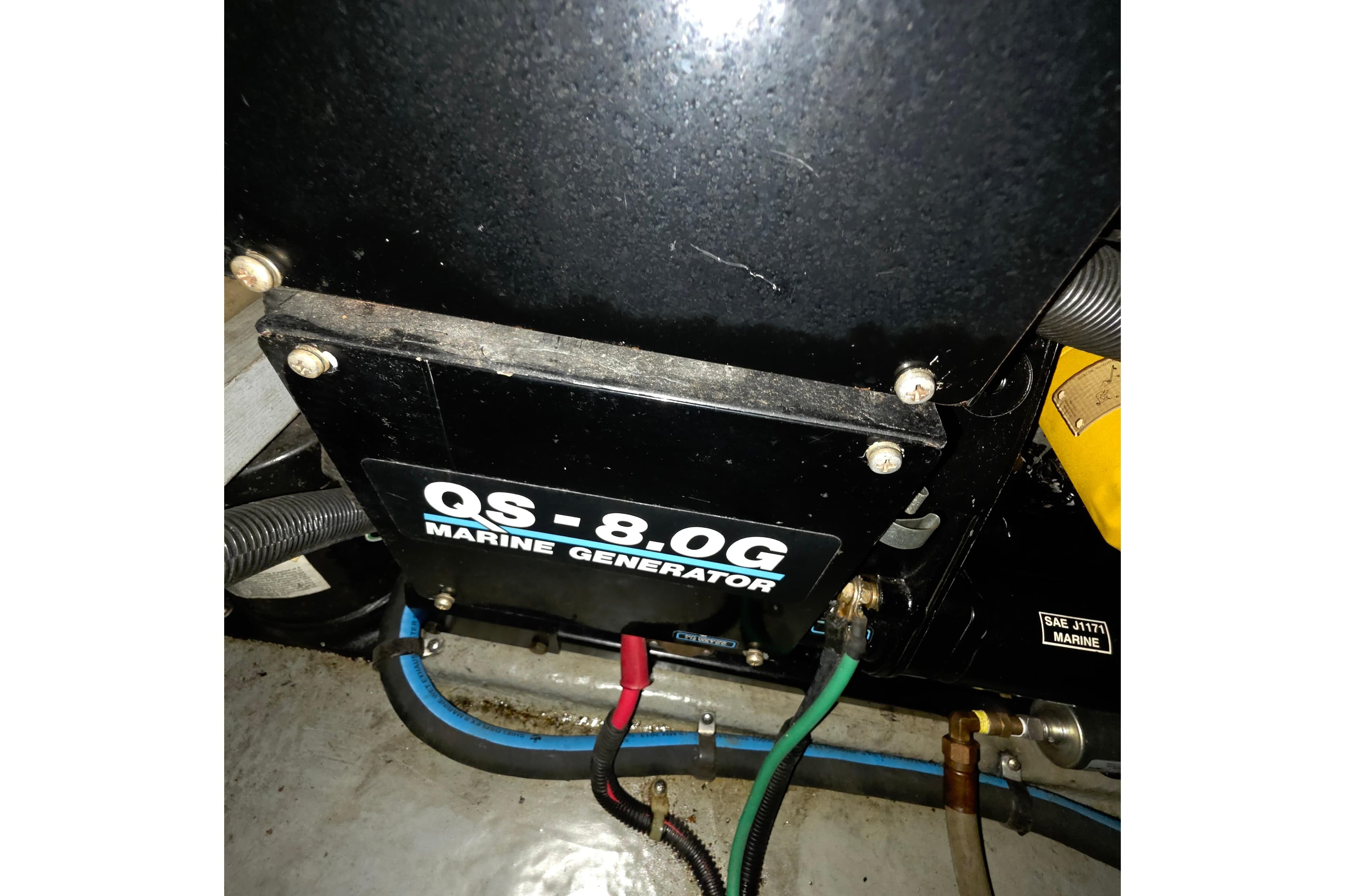 Marine generator in 1989 Sea Ray 420 Sundancer engine room.