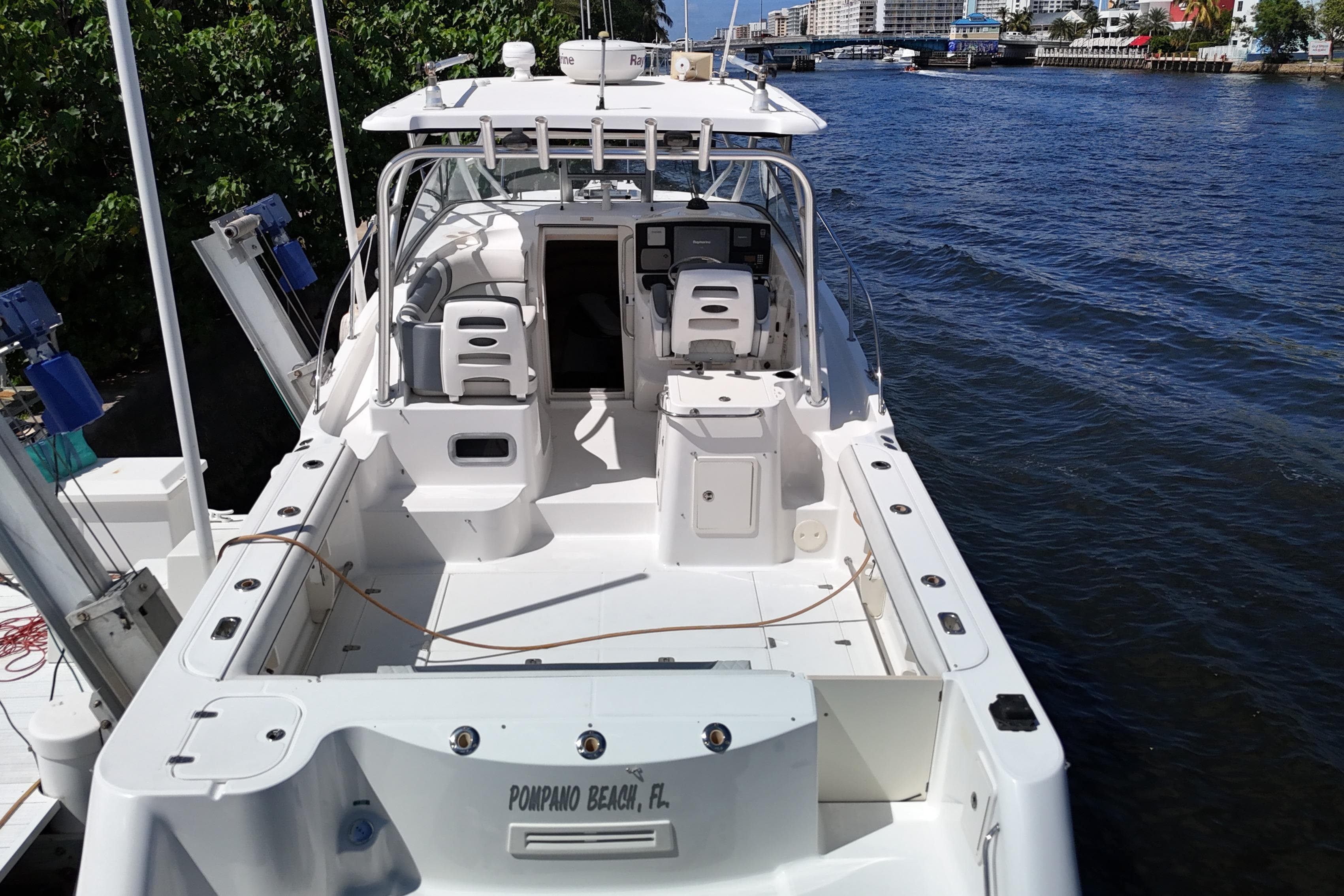 2005 Boston Whaler 305 Conquest boat docked at Pompano Beach, Florida.