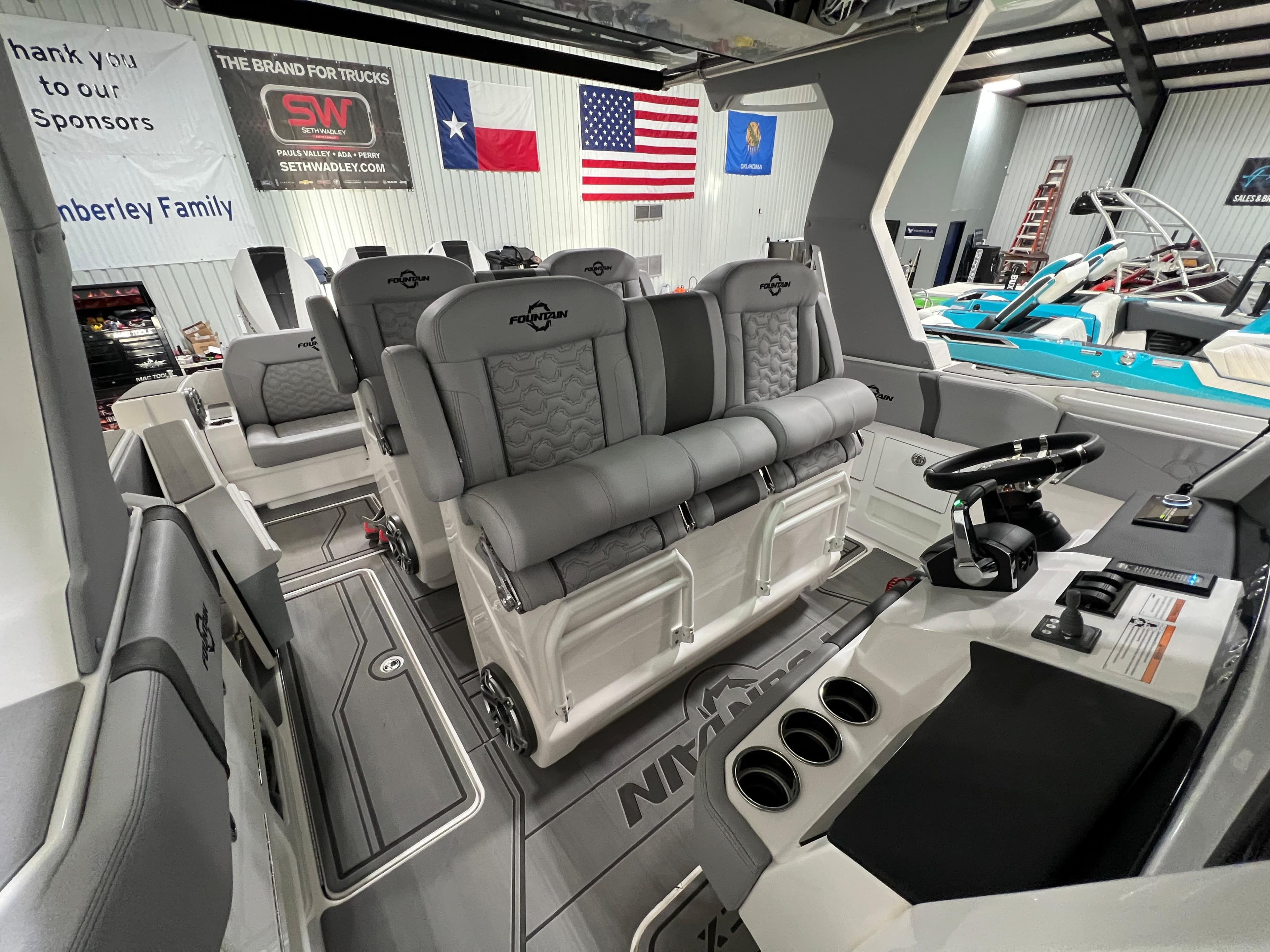 2023 Fountain 38 SCX boat interior with plush seating and modern dashboard.