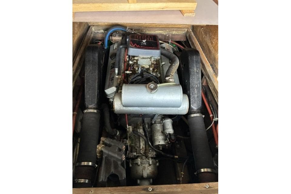 Engine of 1981 Dyer 29 Flush Deck/Bass Boat, showing detailed components and layout.