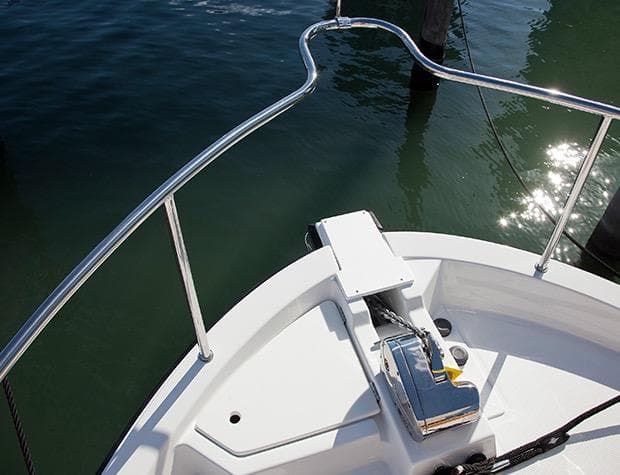 Manufacturer Provided Image: Bow of 2015 Ranger Tugs R-31CB boat with anchor and railing.