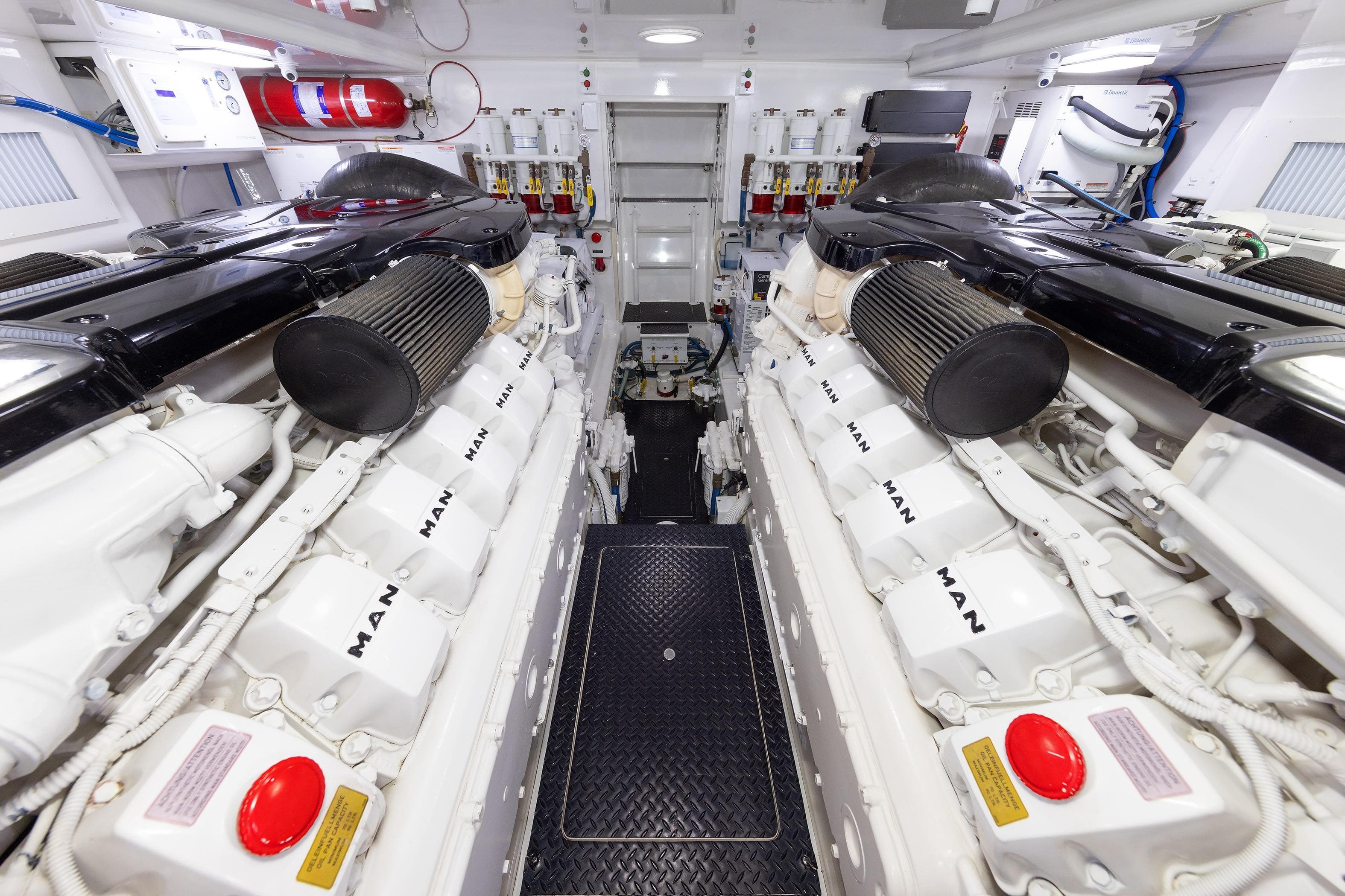 Engine room of 2017 Viking 52 Sport Tower yacht, featuring dual MAN engines.