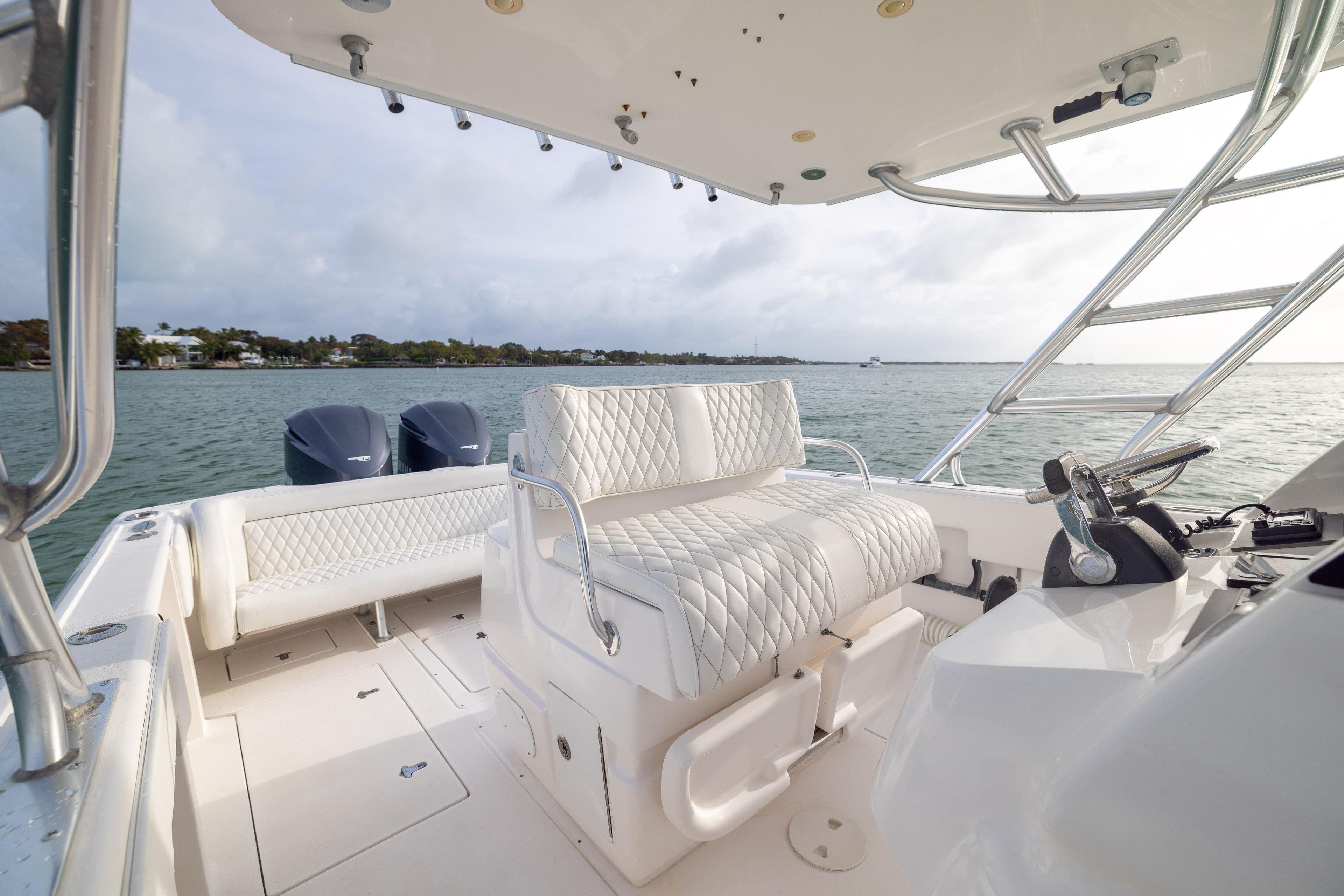 2011 Intrepid 370 Center Console boat interior with luxurious seating and dual engines.
