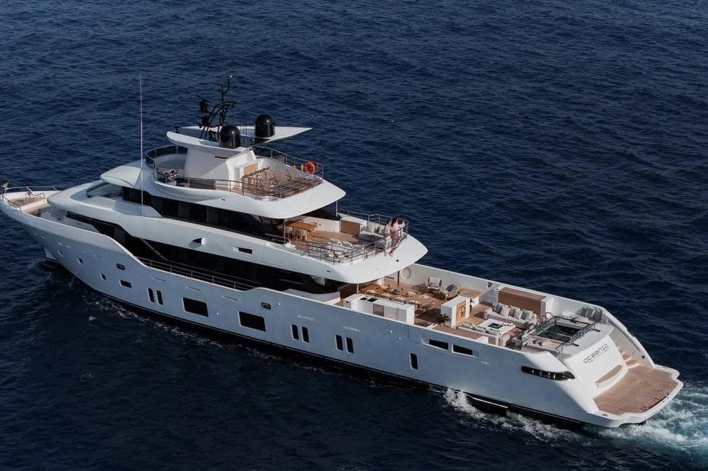 2023 Canados Expedition Yacht cruising on open sea, showcasing luxury design and spacious decks.