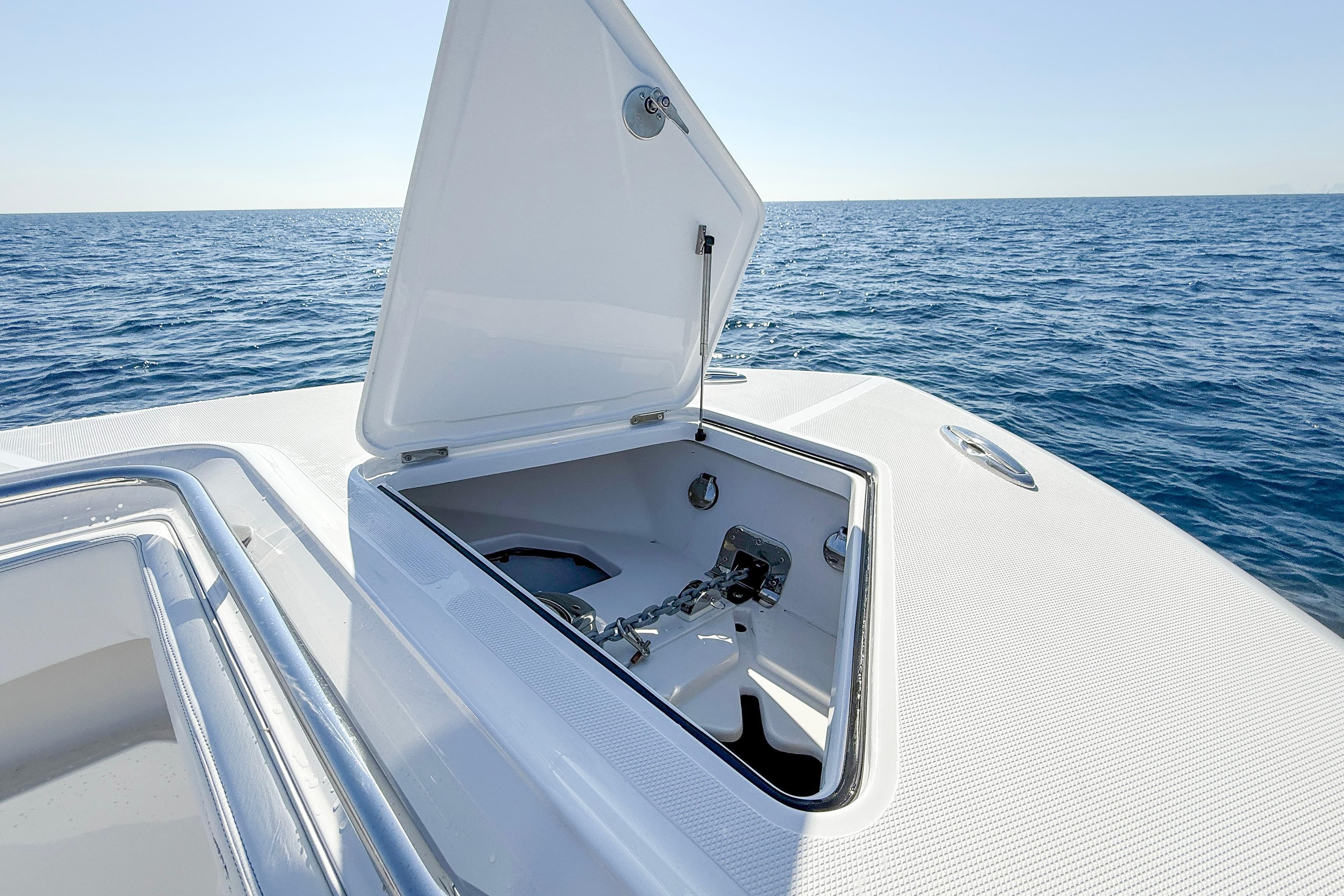 Open anchor compartment on 2026 Blackwater 41 Sportfish boat, ocean background.