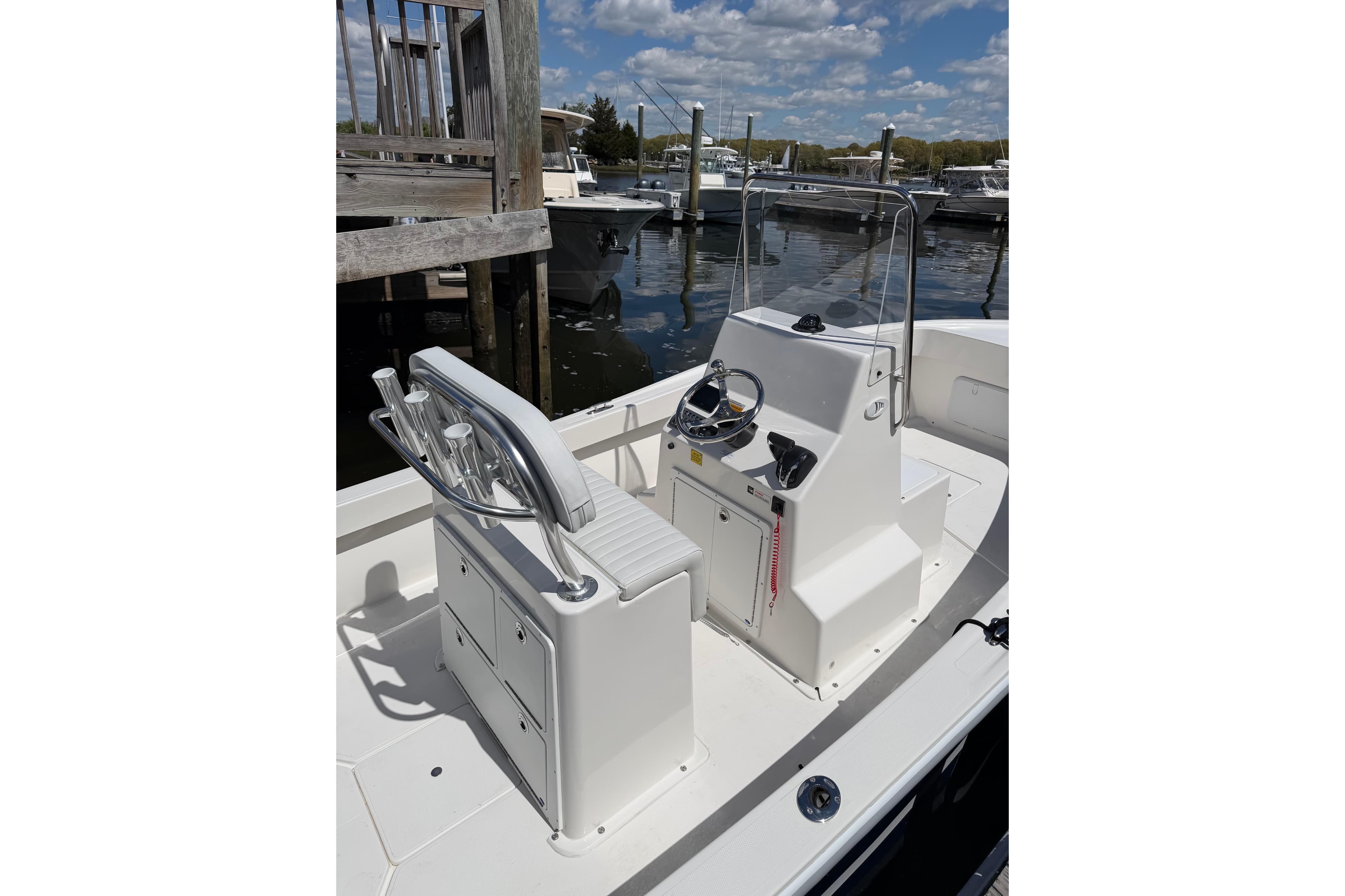 Interior view of 2026 NorthCoast 190 Center Console boat at dock.