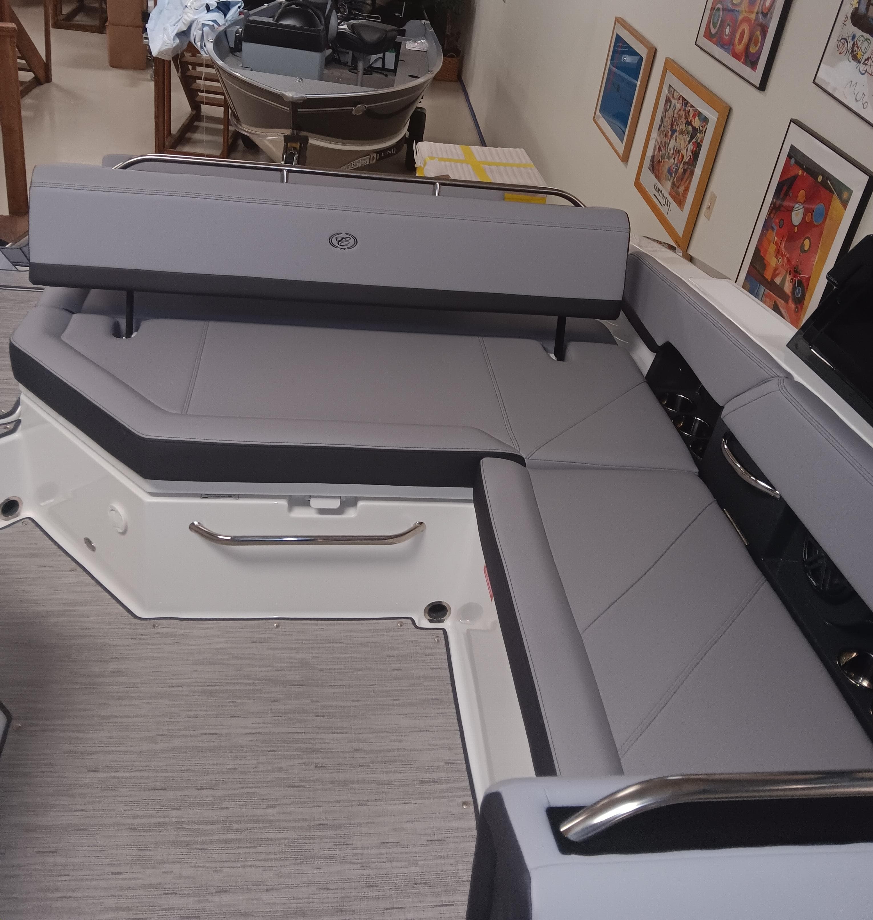 2025 Cobalt R6 boat interior with gray seating and modern design elements.