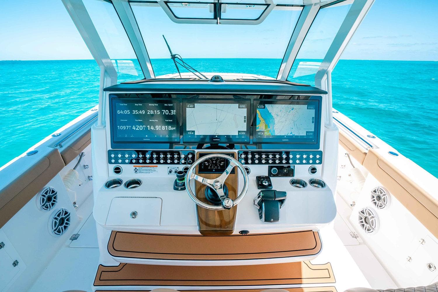 Manufacturer Provided Image: Helm of 2025 Caymas 44 CT boat with advanced navigation screens and controls.