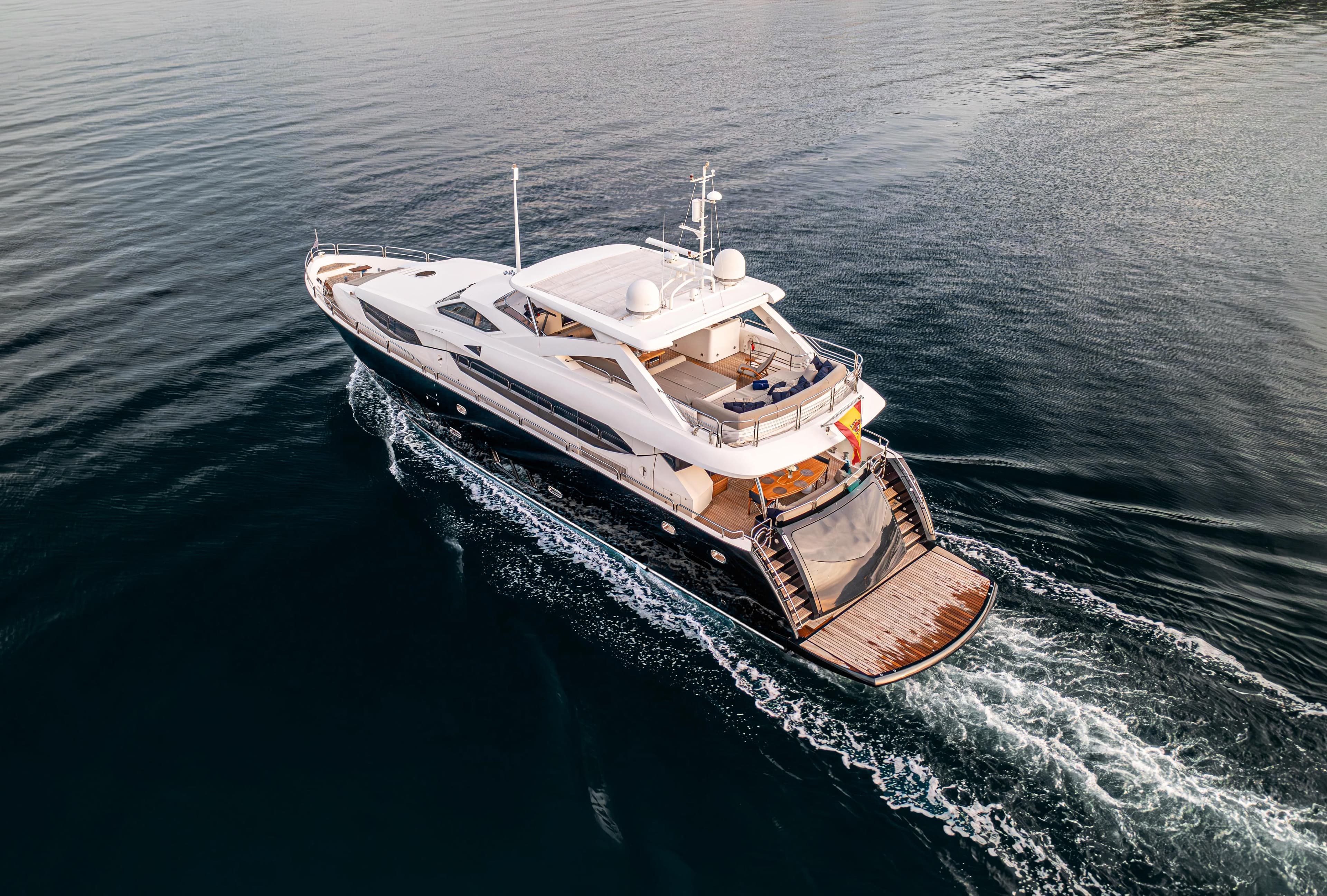 Luxurious 2009 Sunseeker 30 Metre Yacht cruising on calm waters, aerial view.