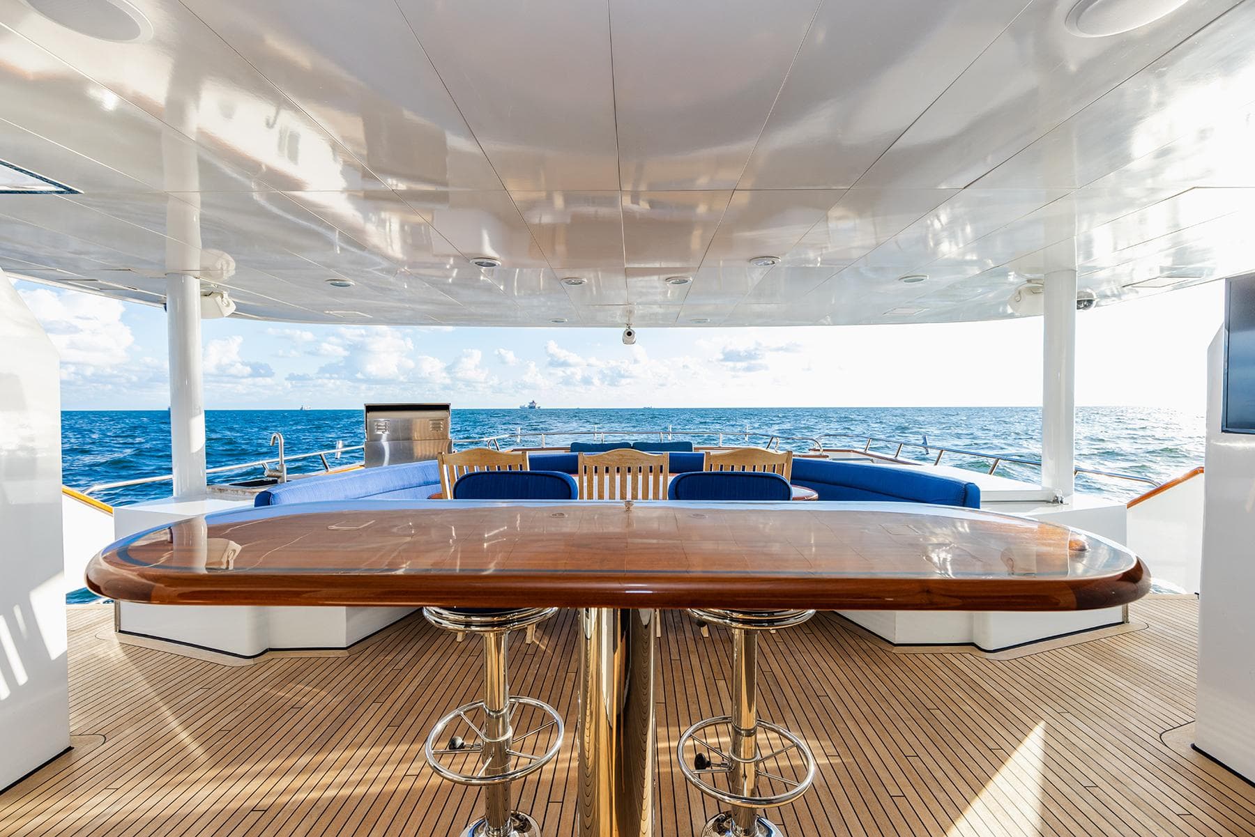 Luxurious deck of 2009 Crystal Motoryacht with ocean view.