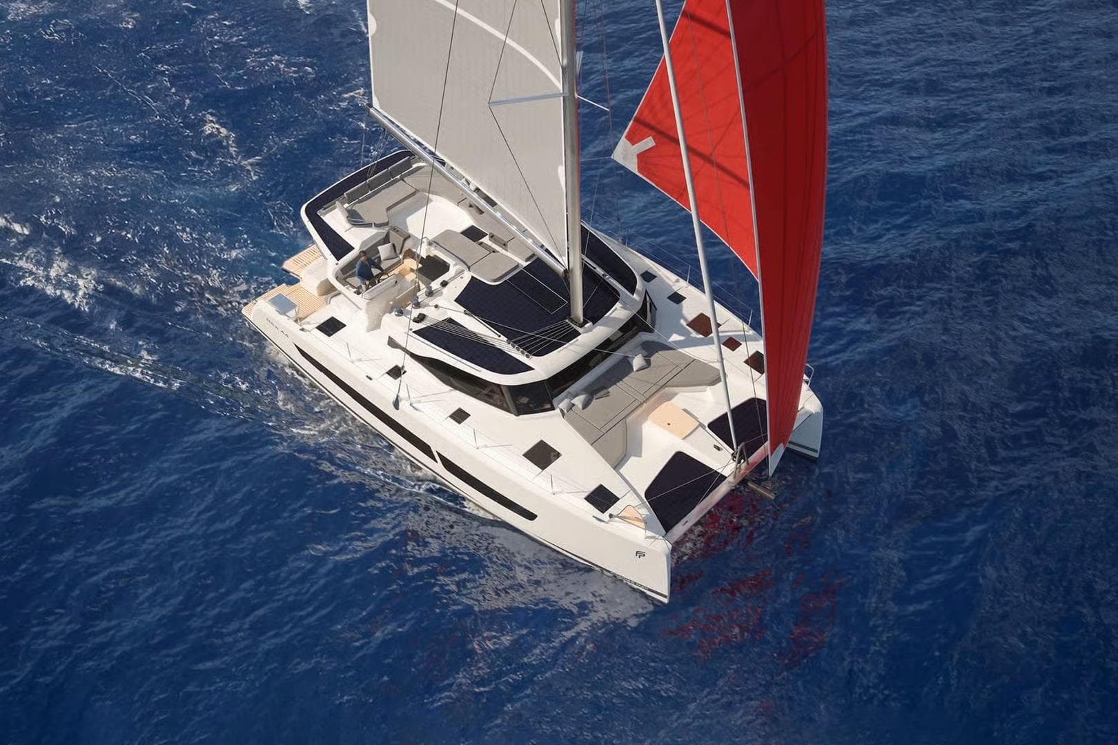2026 Fountaine Pajot NEW 44 catamaran sailing on open blue sea with red and white sails.