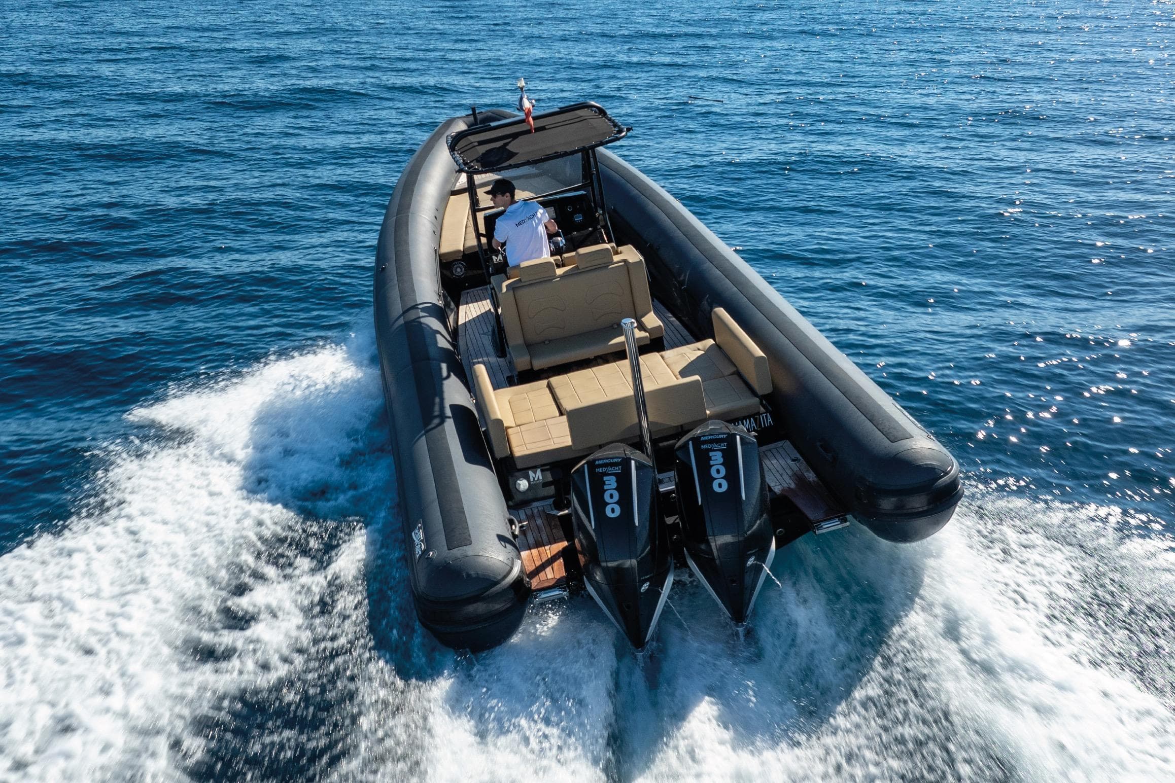 2026 Sea Water Phantom 300 boat cruising on open sea with dual engines.