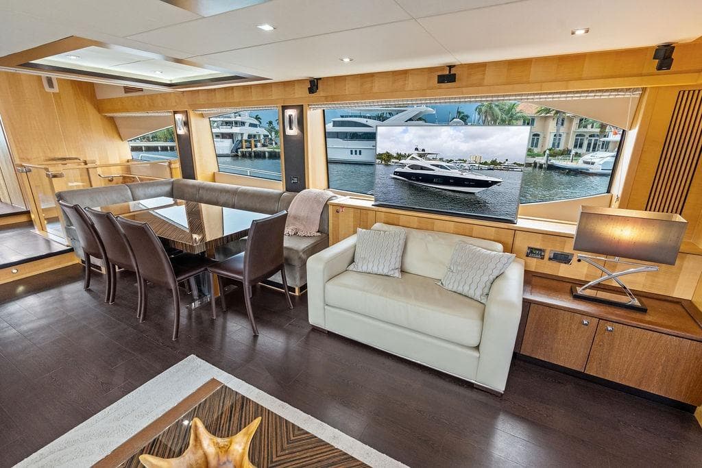 Luxurious interior of 2012 Sunseeker 88 Yacht with elegant dining and seating area.
