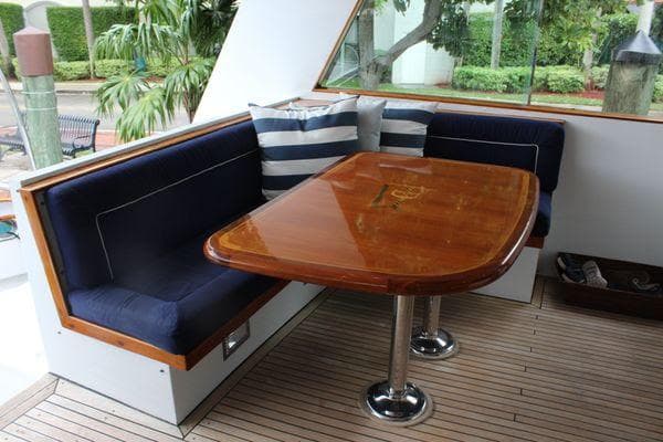 Luxurious seating area on 1983 Cheoy Lee 90 cockpit motor yacht.
