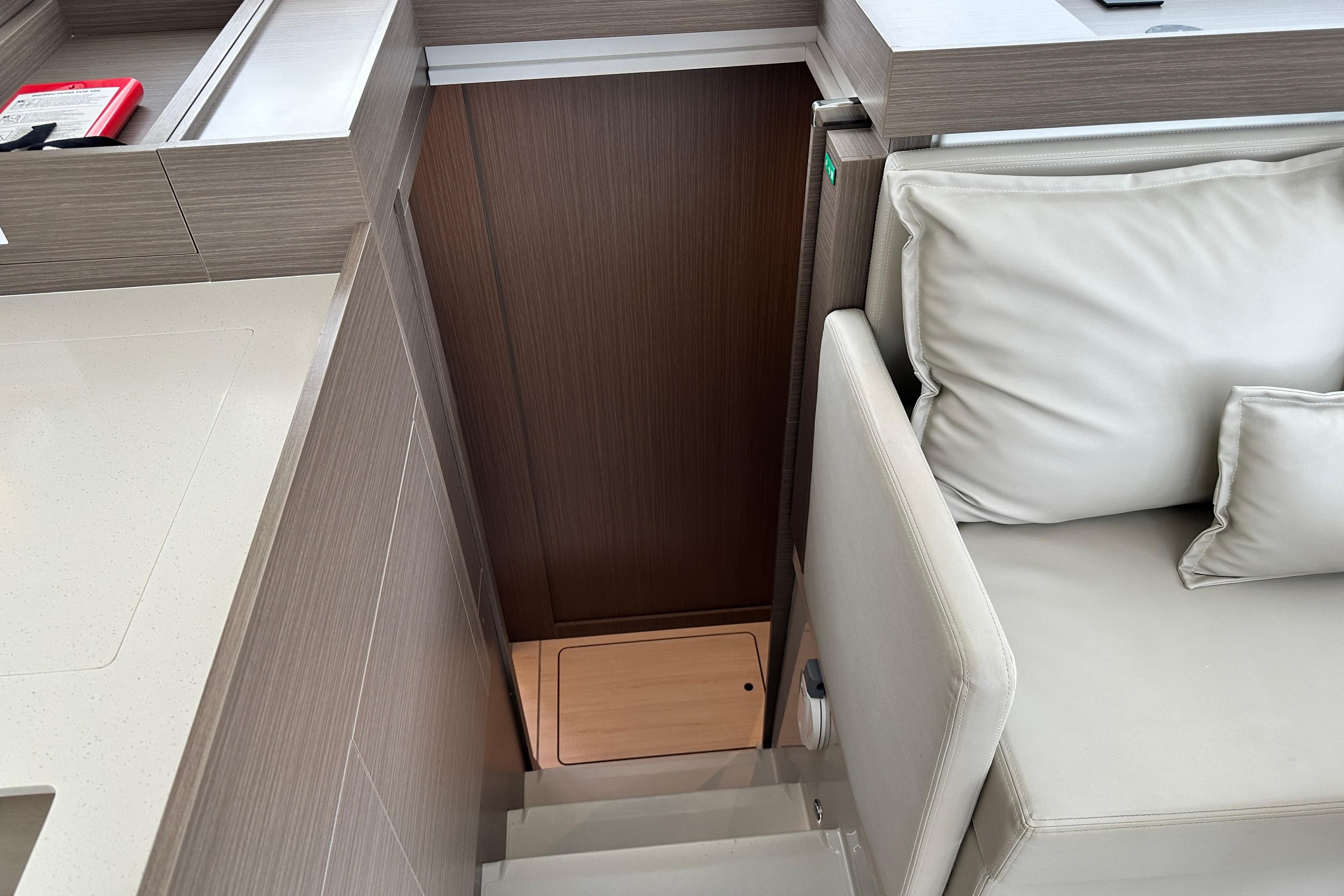 Interior of 2025 Robertson and Caine Leopard 40 Powercat, featuring modern seating and cabinetry.