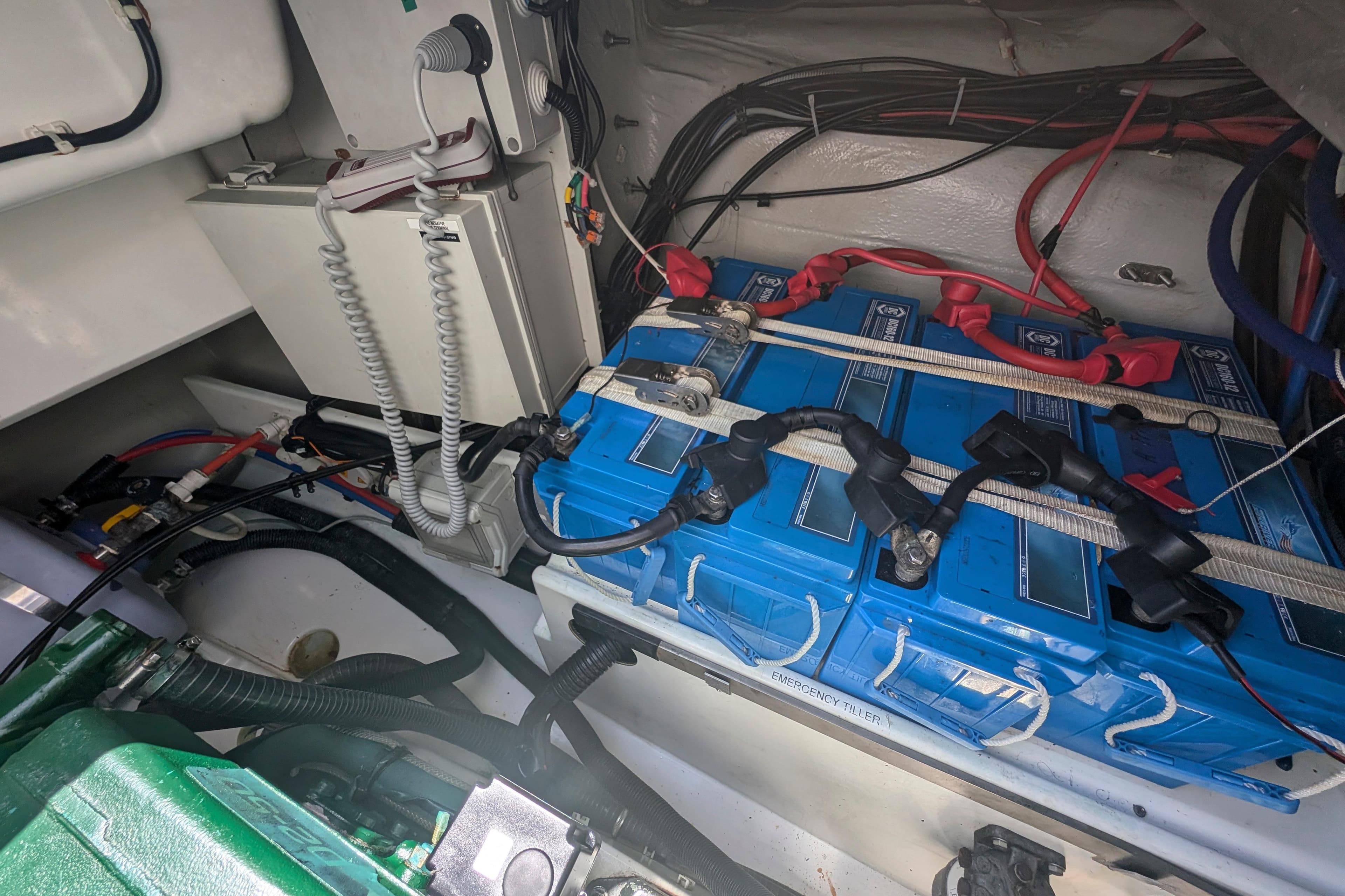 Engine room of 2020 Fountaine Pajot Astrea 42 with batteries and wiring.