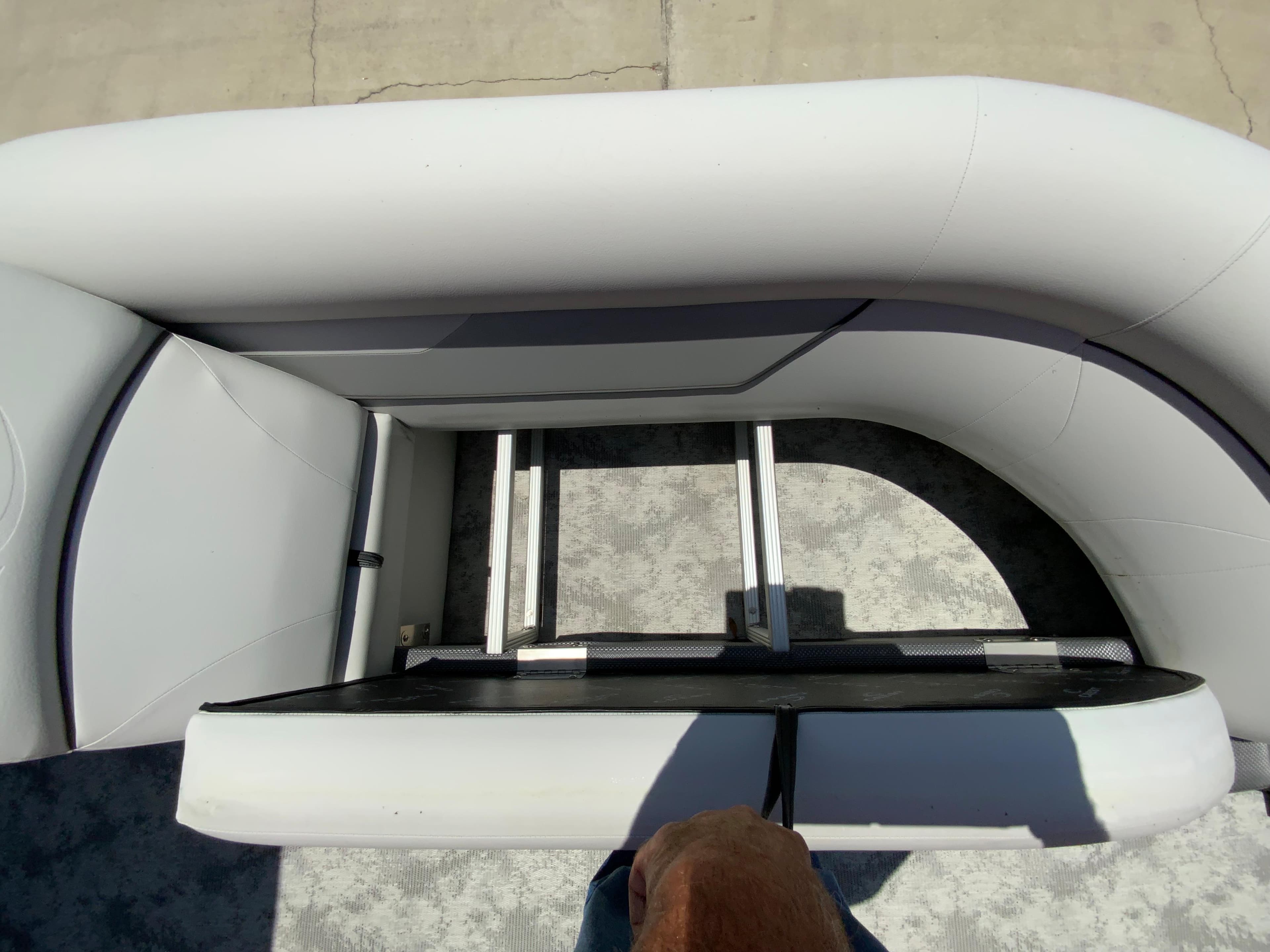 2023 Crest Classic LX 220 SF boat interior seating and ladder.