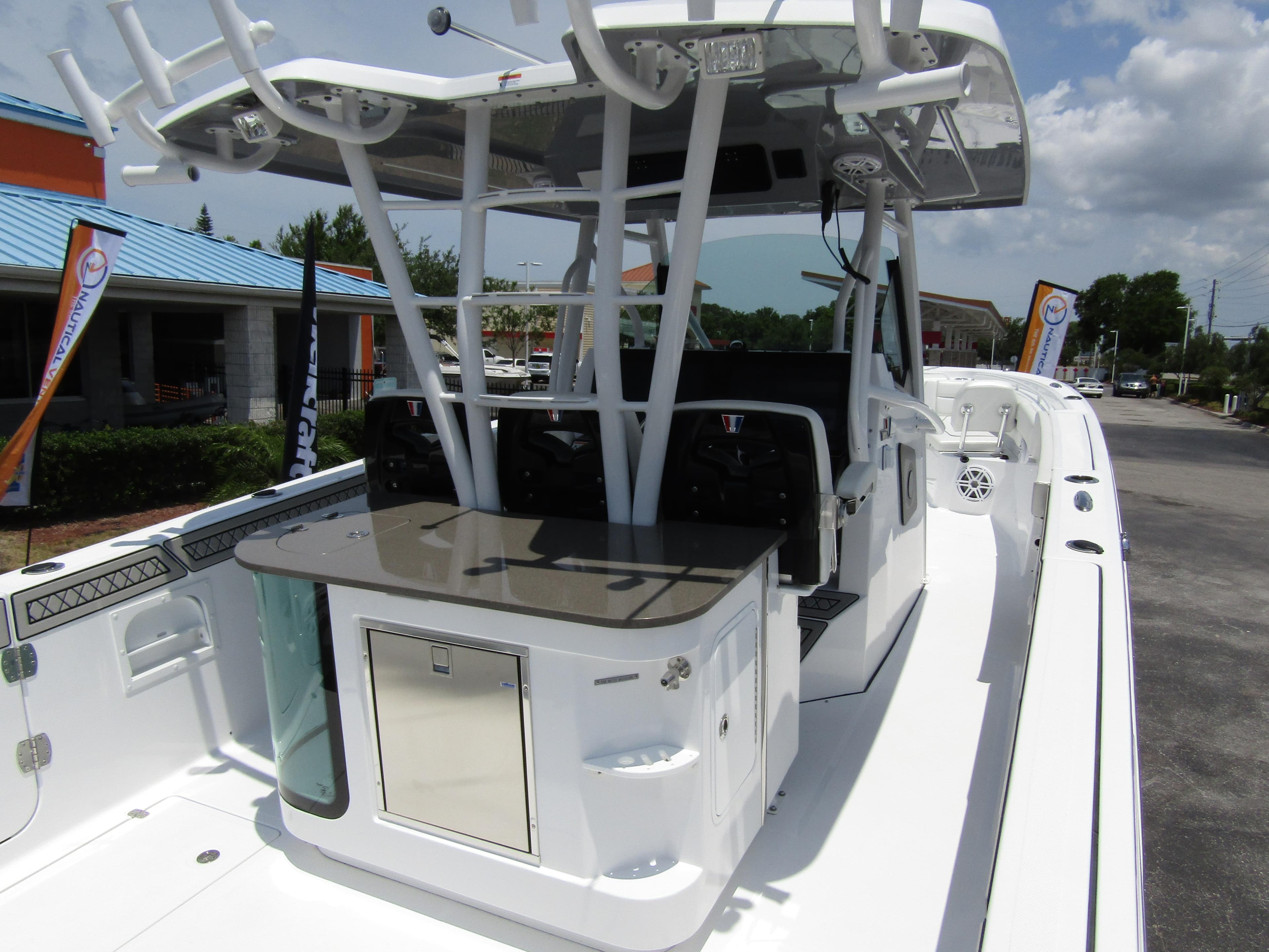 2024 Wellcraft 352 Fisherman boat interior with center console and seating.