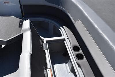 Interior view of a 2025 Lowe LS 170 boat, featuring seating and cup holders.