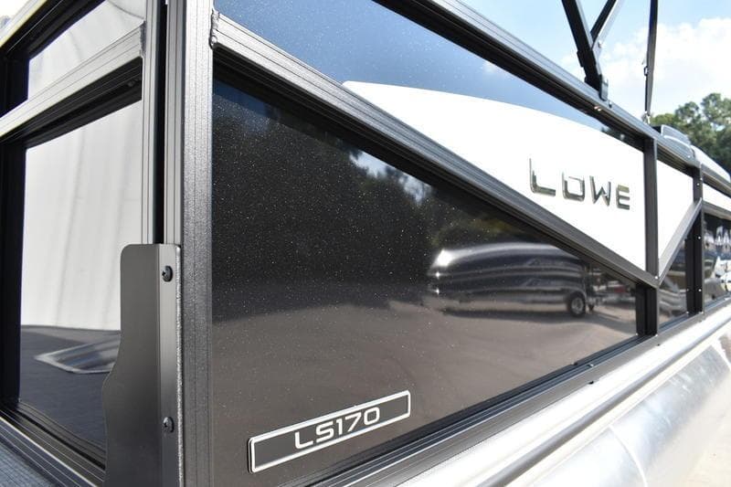 2026 Lowe LS 170 boat side view with sleek black finish and logo.