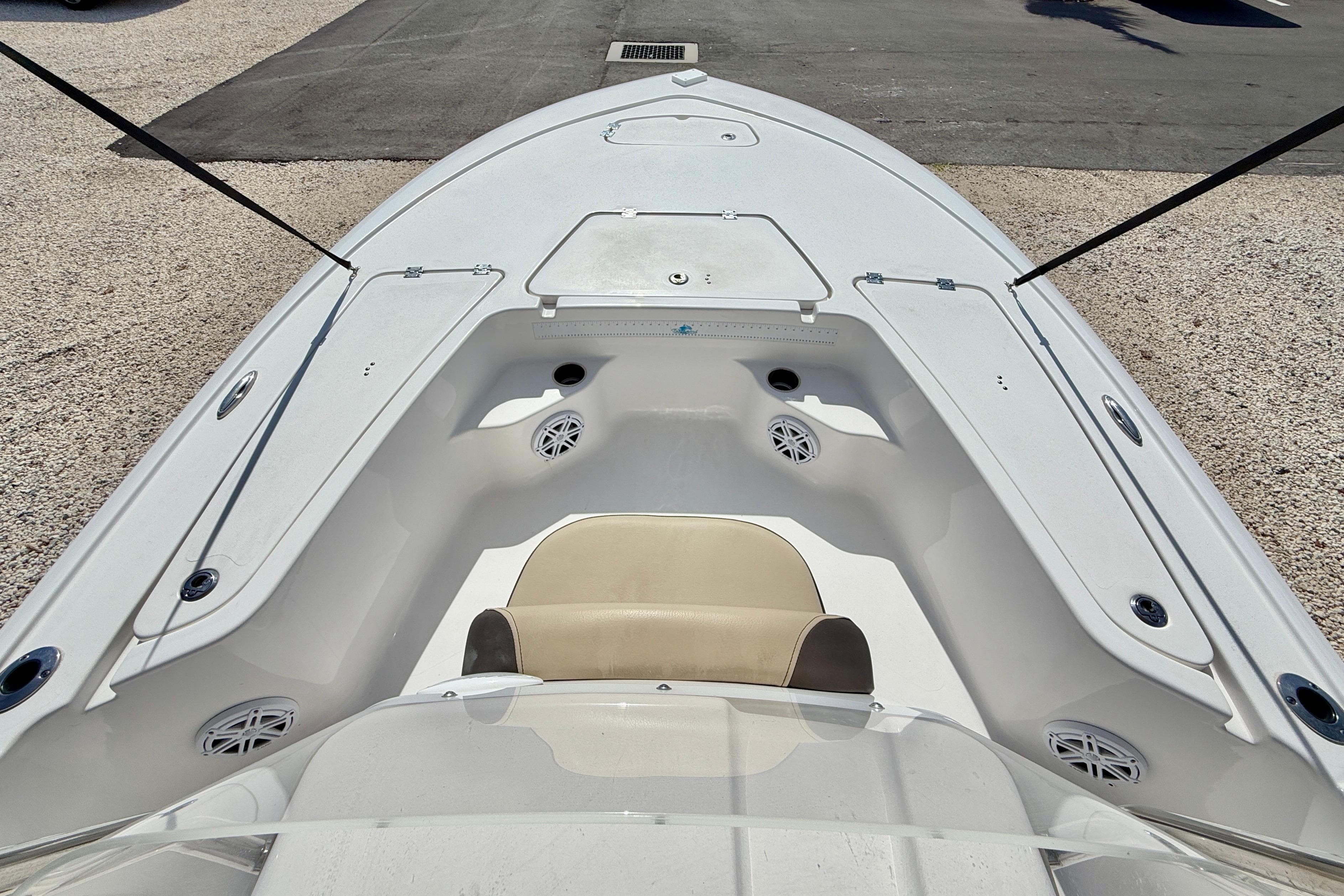 2021 Tidewater 1910 Bay Max boat interior with seating and storage compartments.