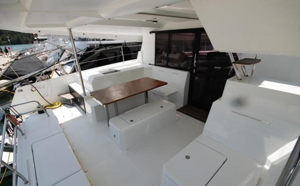 2021 Fountaine Pajot Catamaran Astrea 42 deck with seating and table.