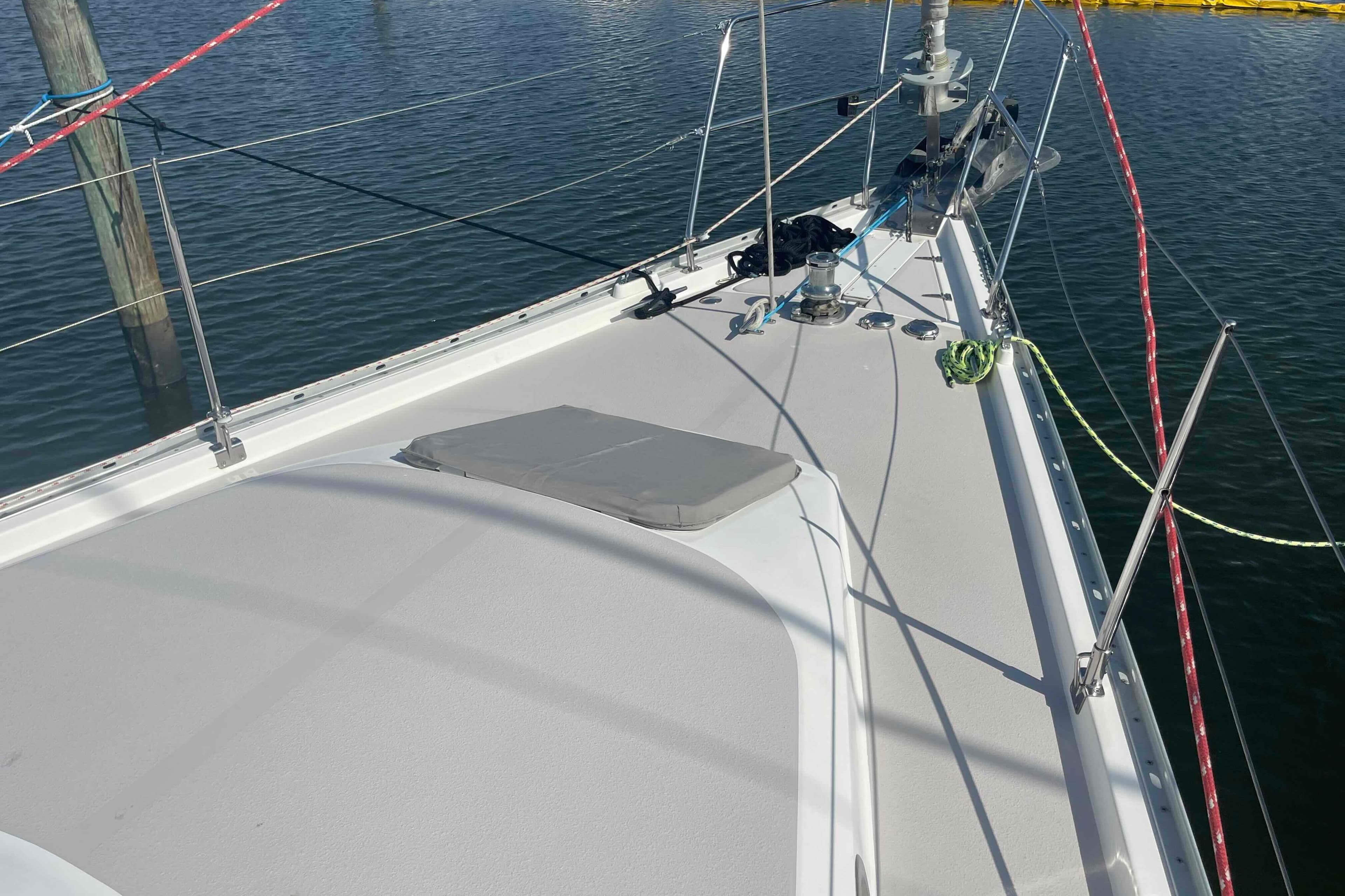 Deck view of 2013 Catalina Morgan 440 sailboat in marina.