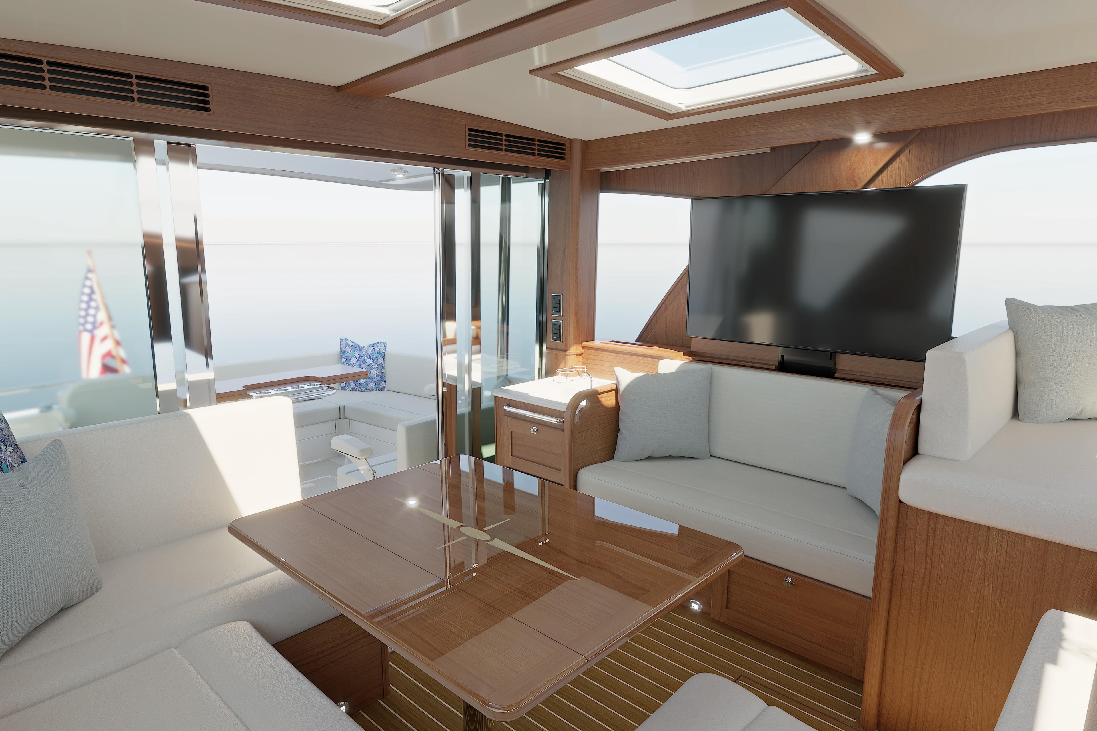 Luxurious interior of 2026 Sabre 51 Salon Express yacht with modern seating and large TV.