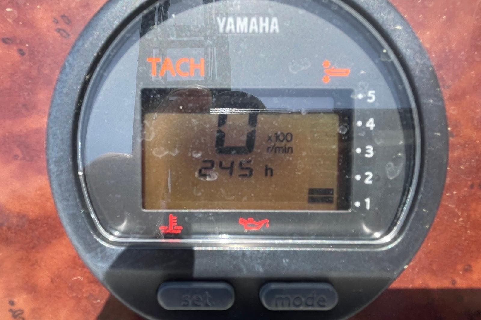 Yamaha tachometer displaying 245 hours on a 2013 Sea Hunt Escape 211 LE boat.