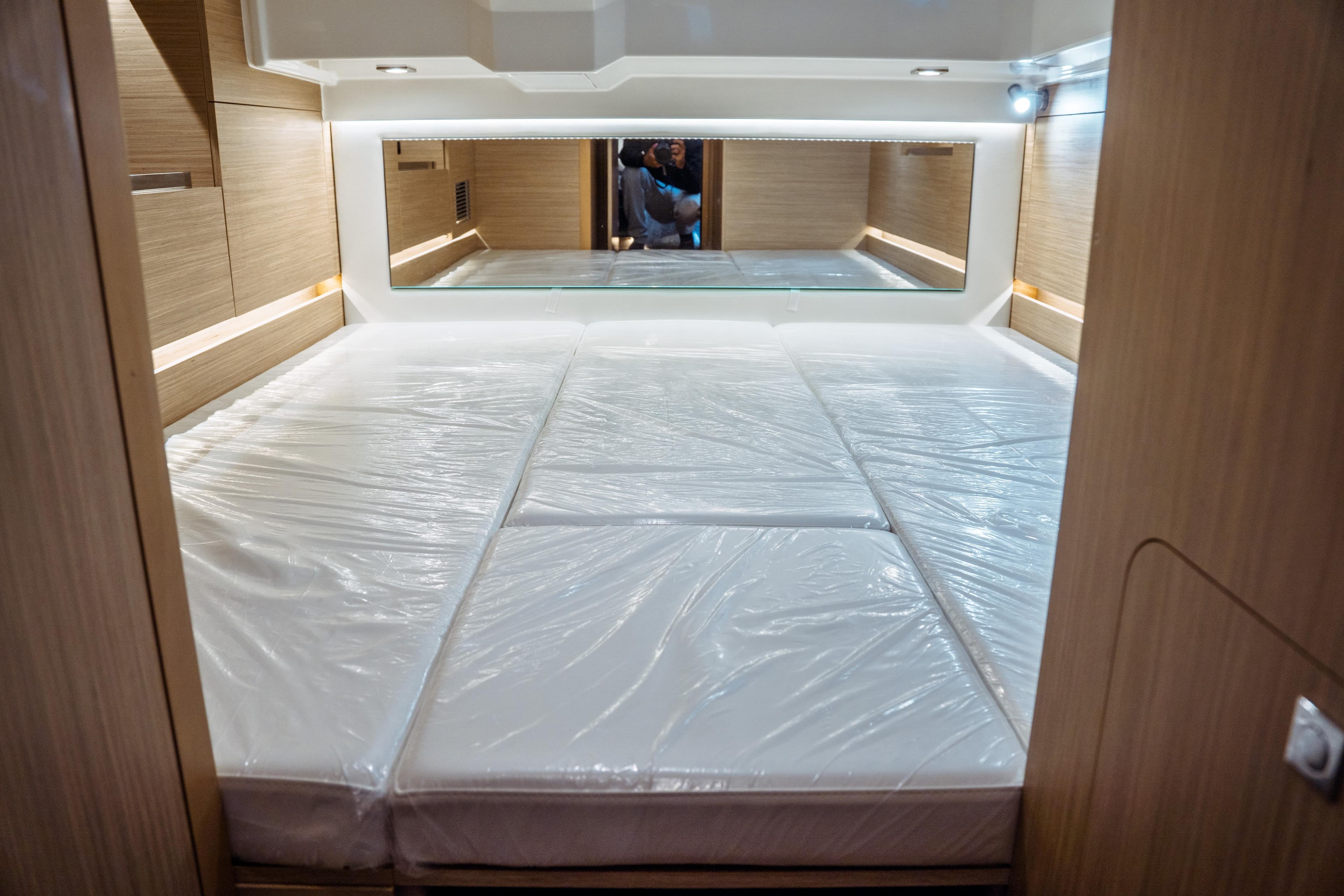 2025 Jeanneau Leader 10.5 WA Series 2 cabin interior with spacious bed and modern design.