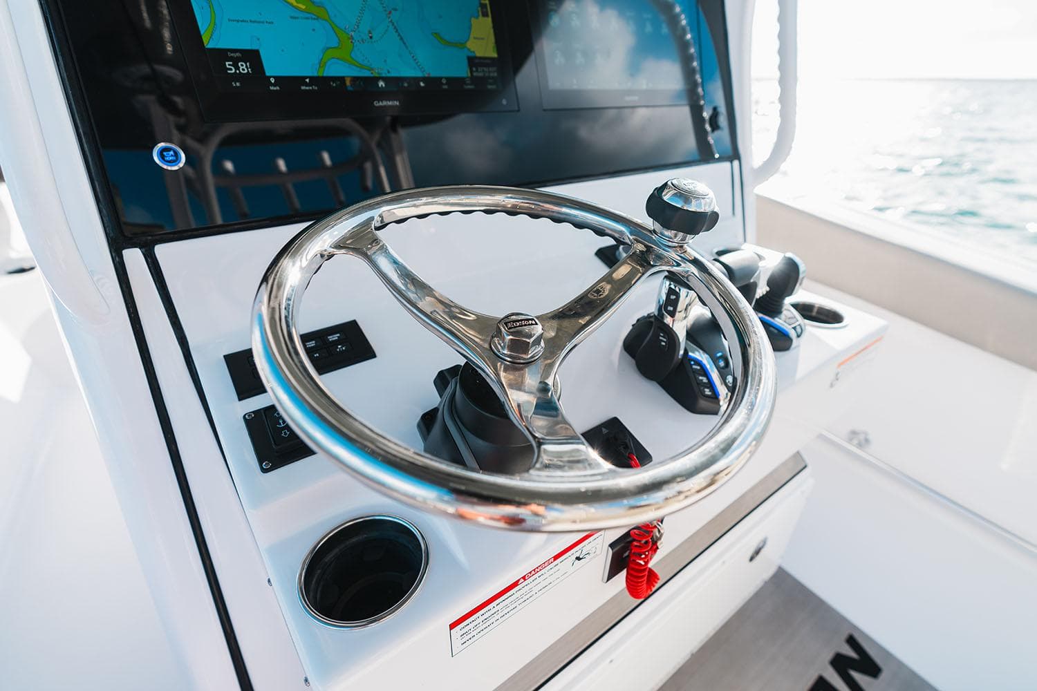 Manufacturer Provided Image: 2025 Sportsman Open 282 Center Console steering wheel and controls.