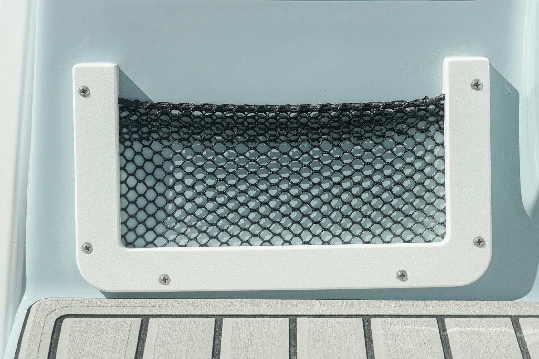 2026 Tidewater 232 CC Adventure boat storage net detail.