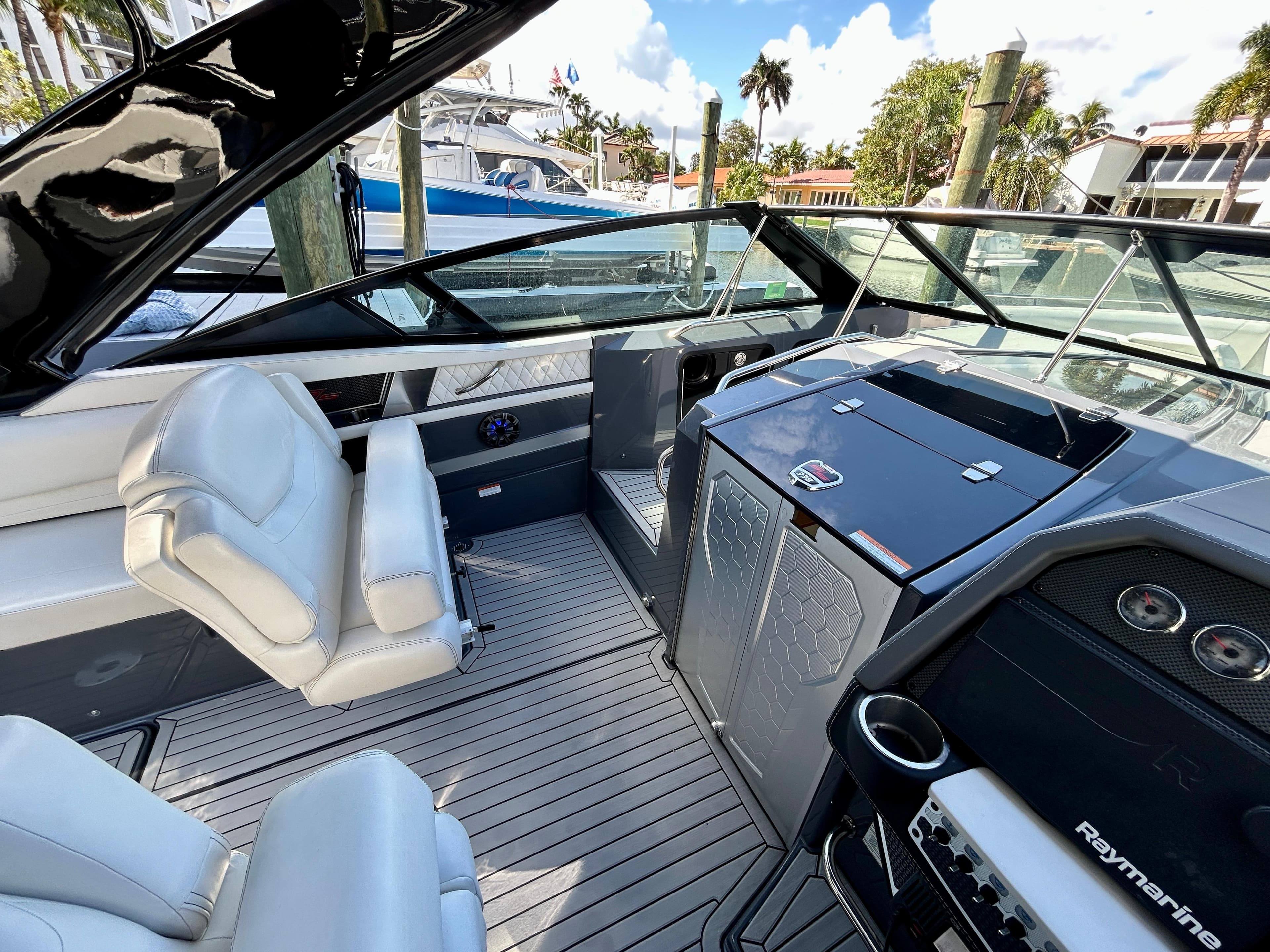 2021 Cruisers Yachts 338 South Beach Edition Bow Rider interior with sleek design and modern controls.