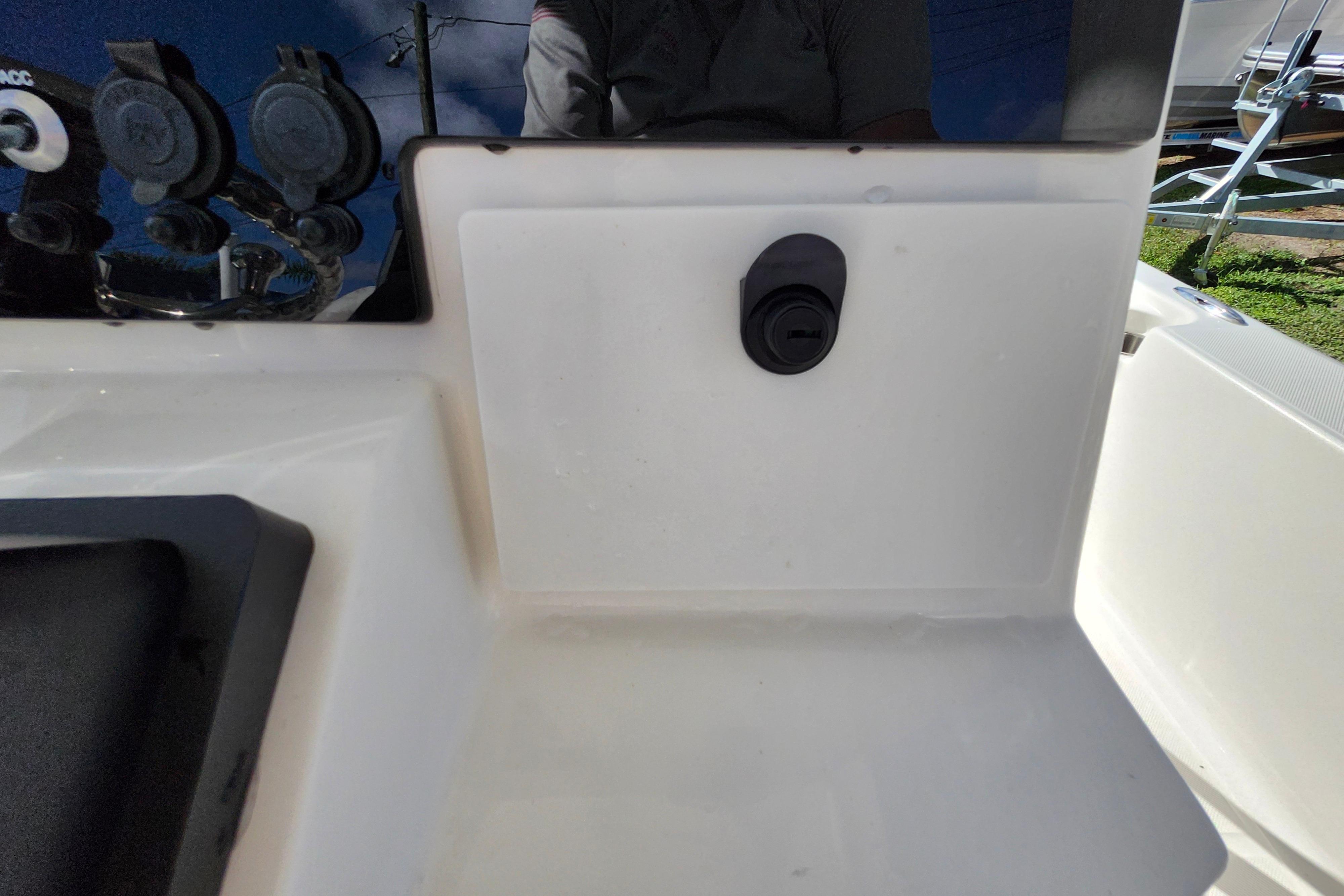 2023 Sea Born FX22 Bay boat dashboard with control panel and switches.