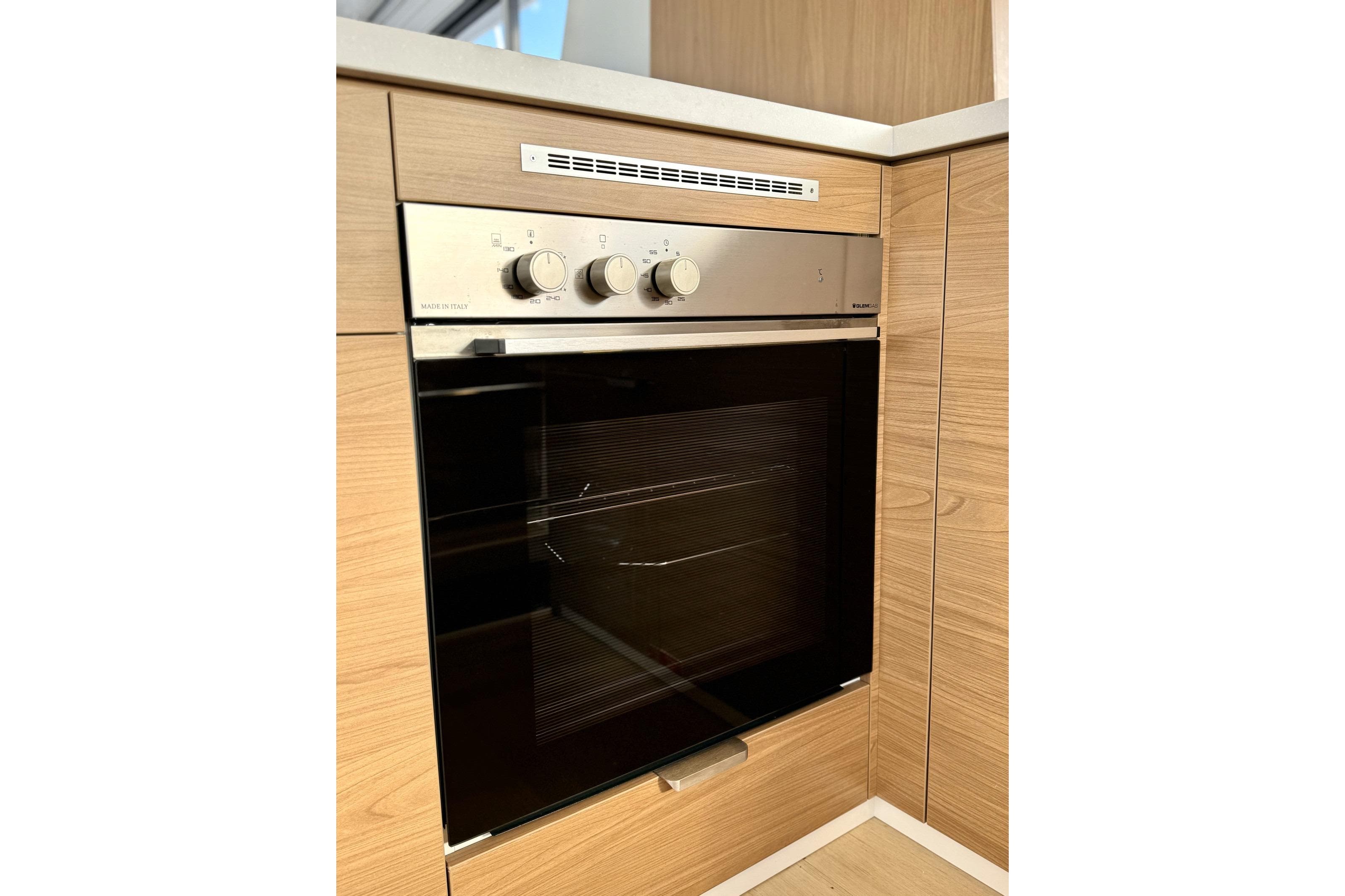 2024 Bali 4.6 oven in modern wooden kitchen setting.