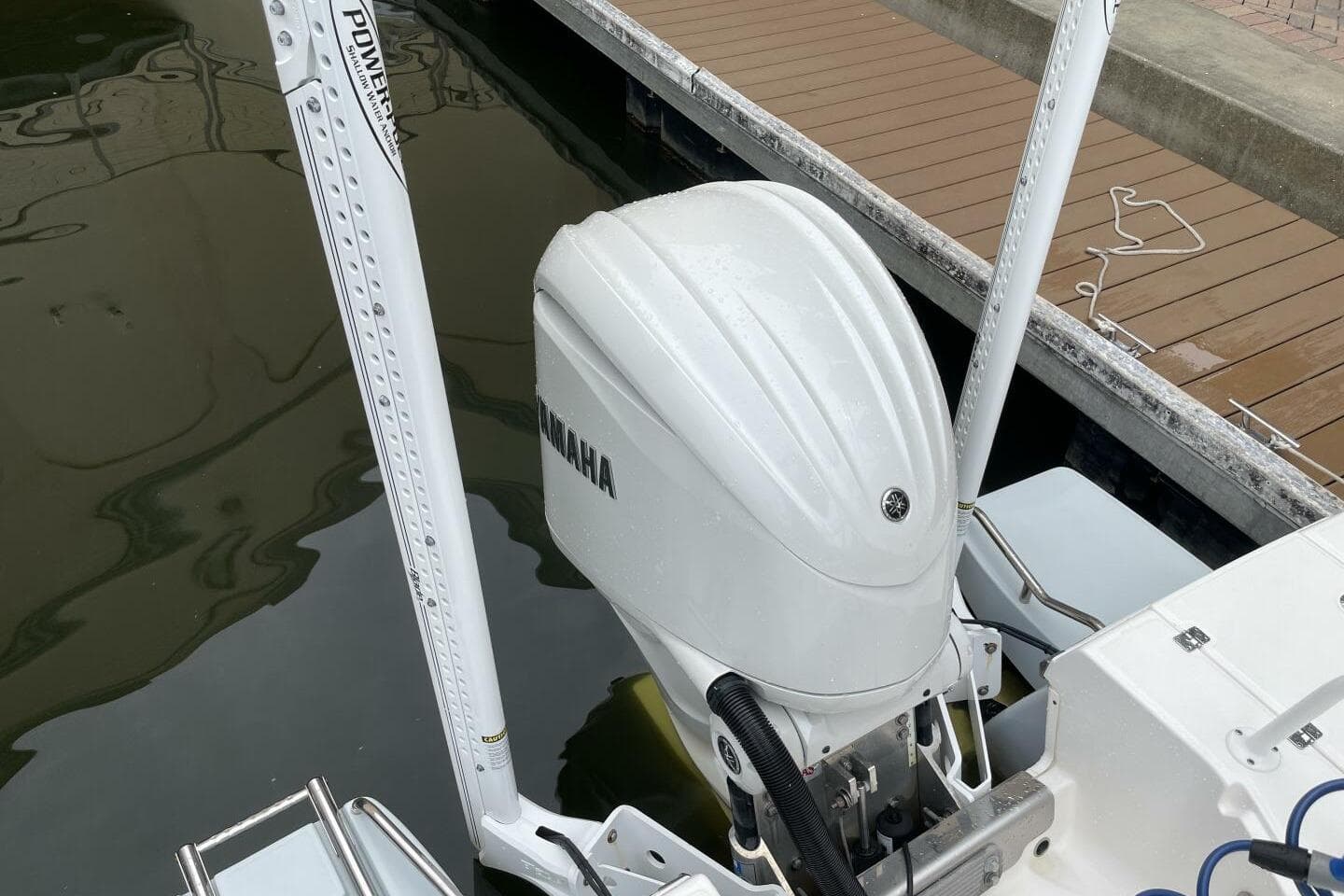 2022 Robalo 246 Cayman SD with Yamaha outboard engine at dockside.