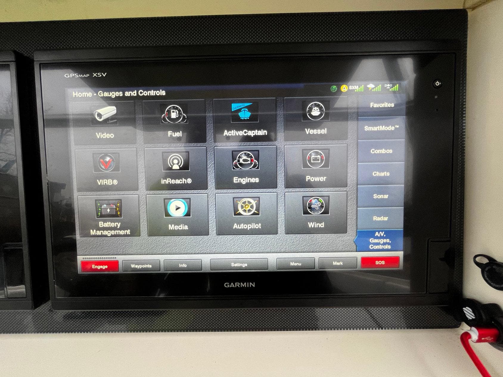 Garmin GPS display on 2011 Fountain 38 CC Tournament Edition boat, showing various control options.