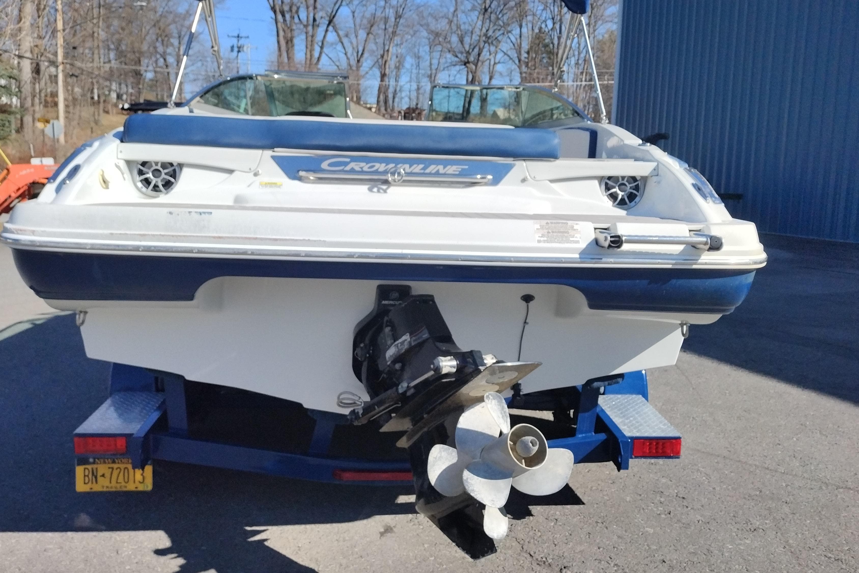 2017 Crownline 225 SS boat on trailer, rear view with visible propeller.