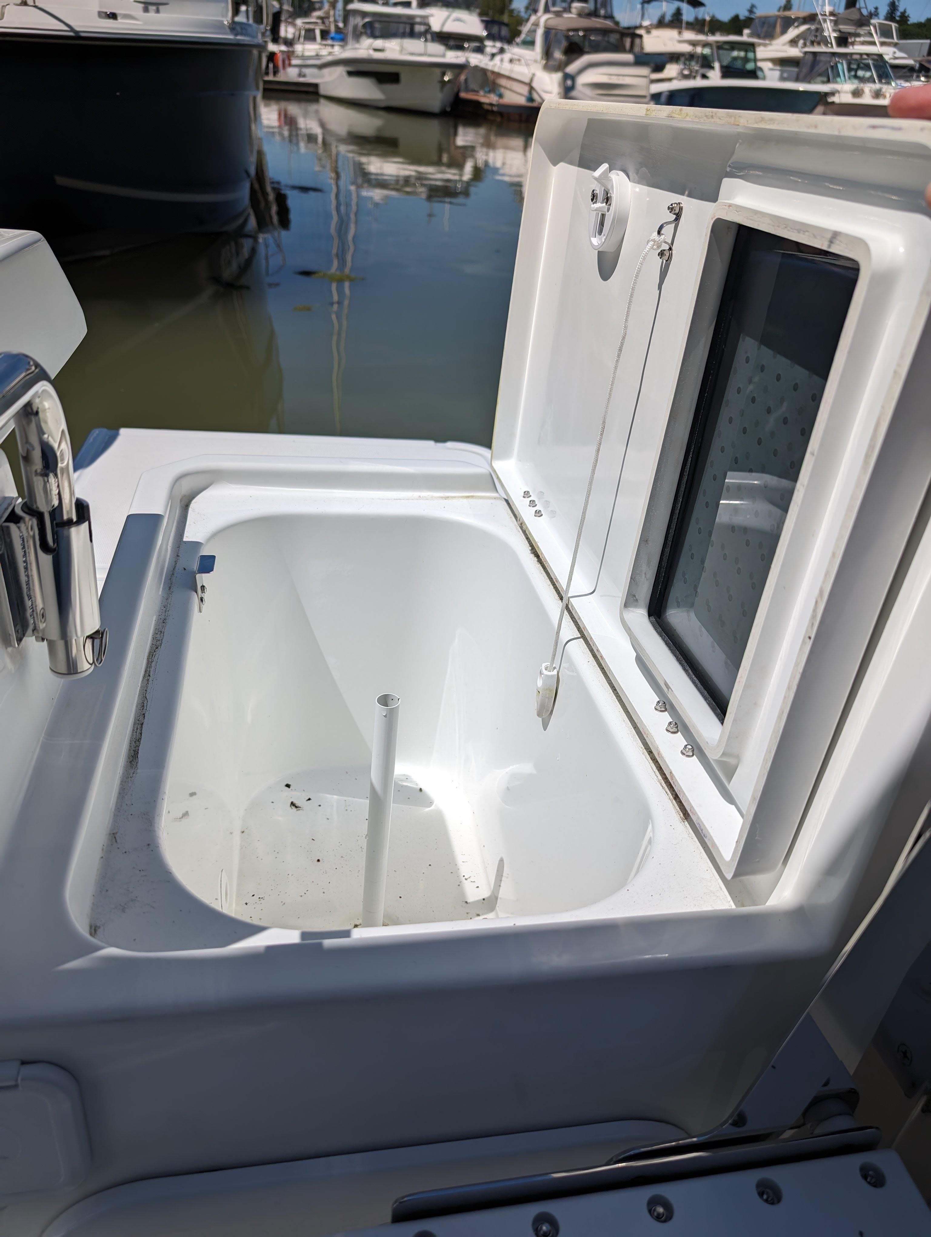 2024 Jeanneau NC Sport 795 Series 2 boat sink and storage area.