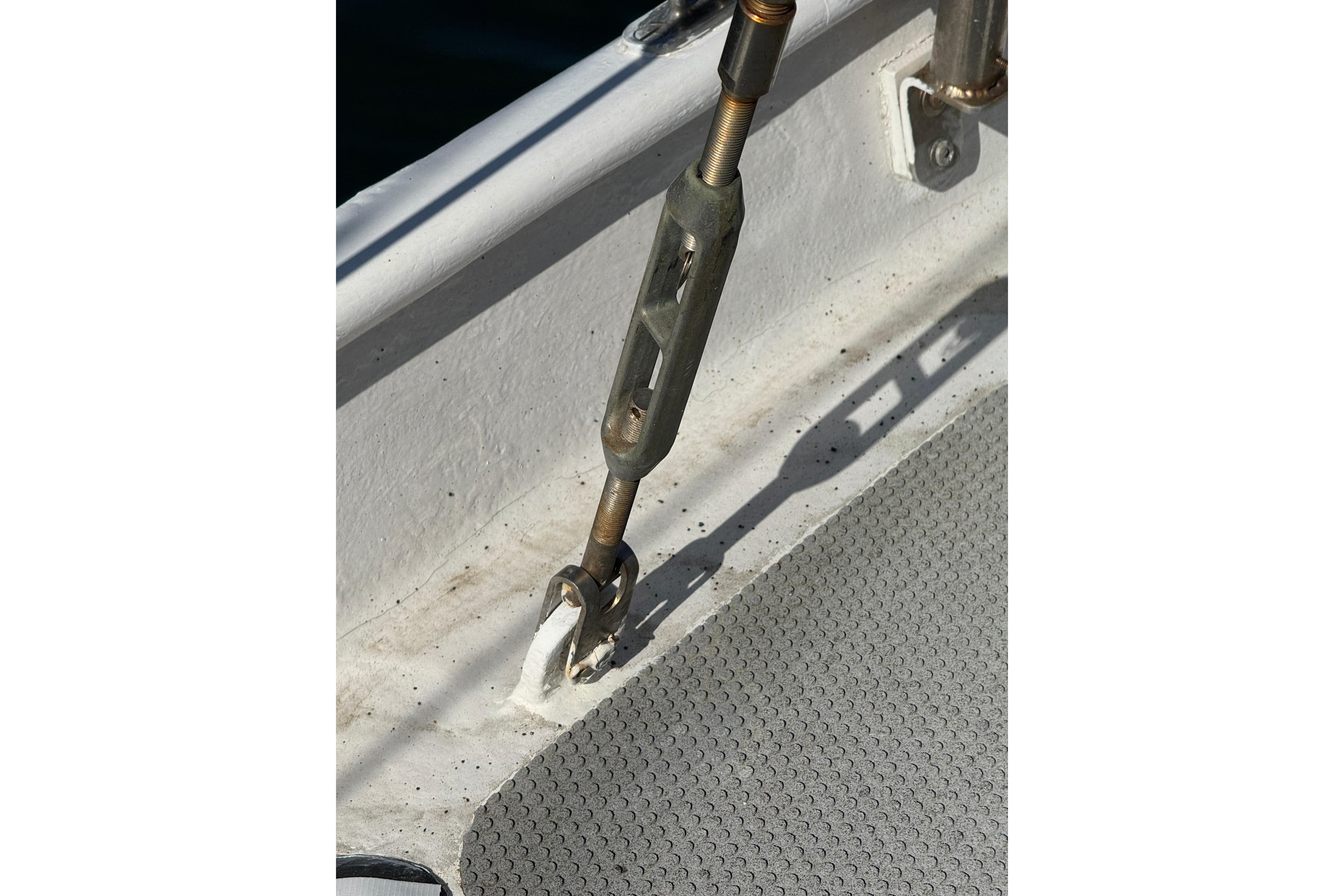 Close-up of a turnbuckle on a 1992 Bruce Bingham Custom Steel Hull 47 boat deck.