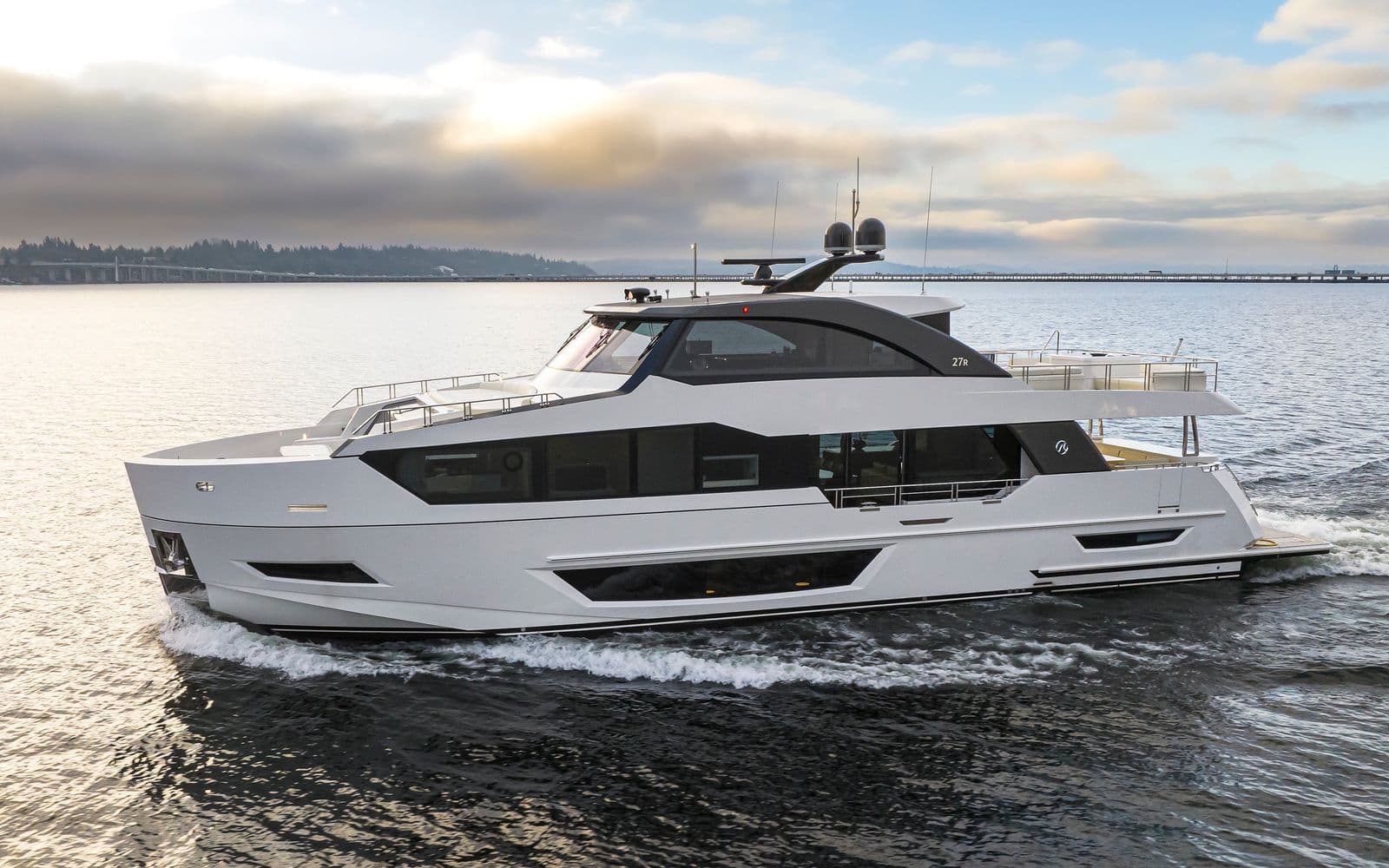 Luxury yacht Ocean Alexander 27R 2027 on calm waters.