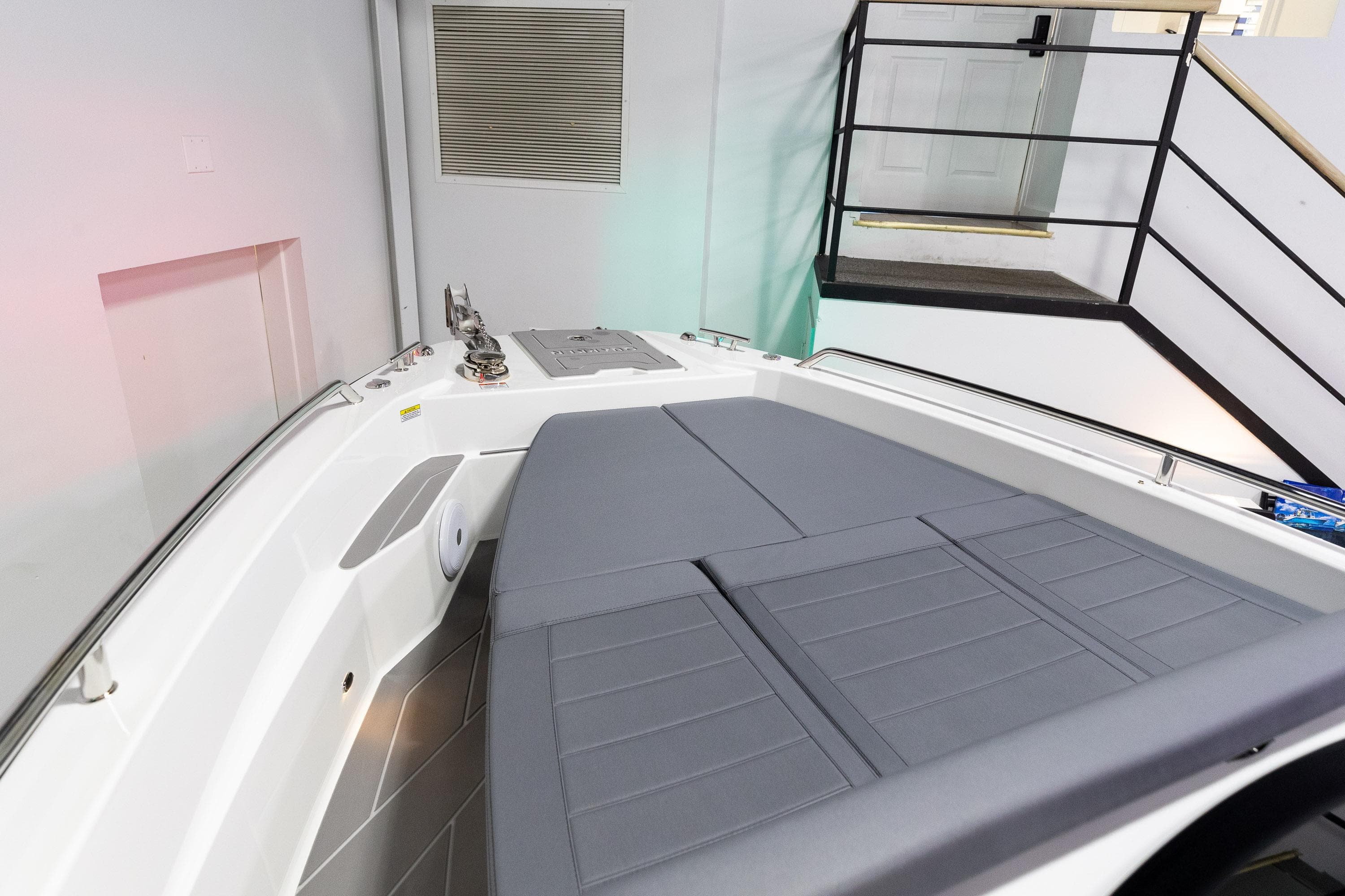2024 Quarken 27 T-Top V2 boat interior with sleek seating and modern design.