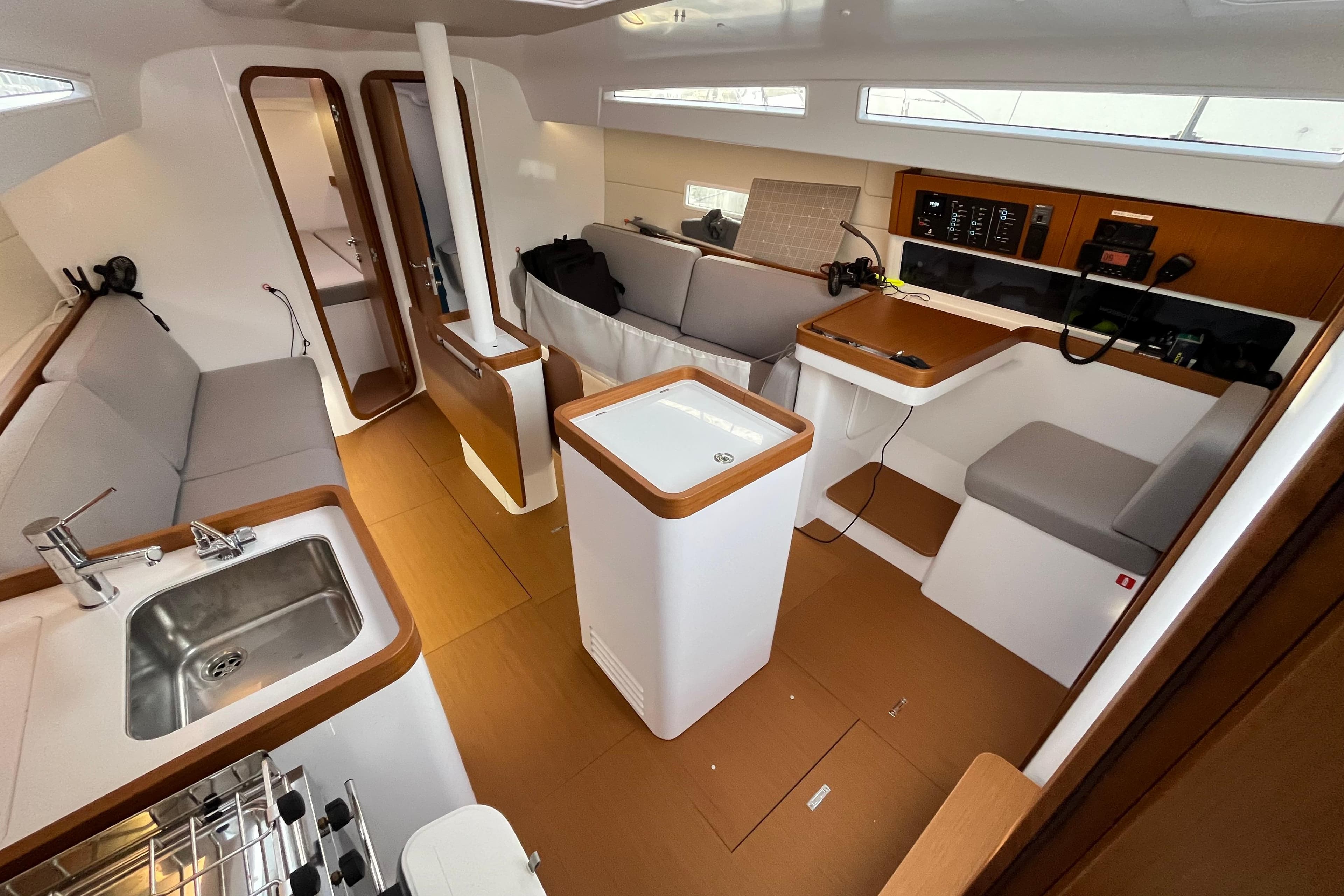 Interior of 2025 Beneteau First 36 sailboat, featuring modern design and spacious layout.